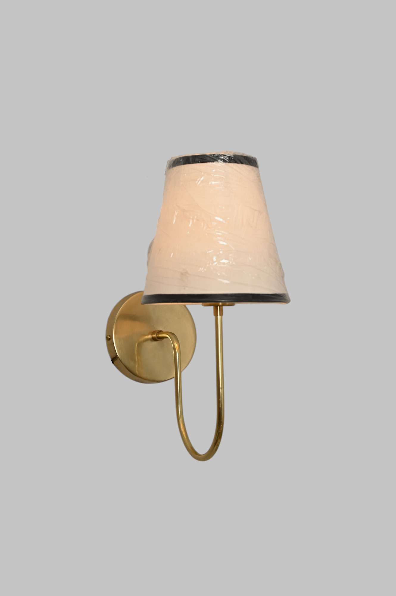 This brass chandelier features natural finish variations, enhancing its unique charm.