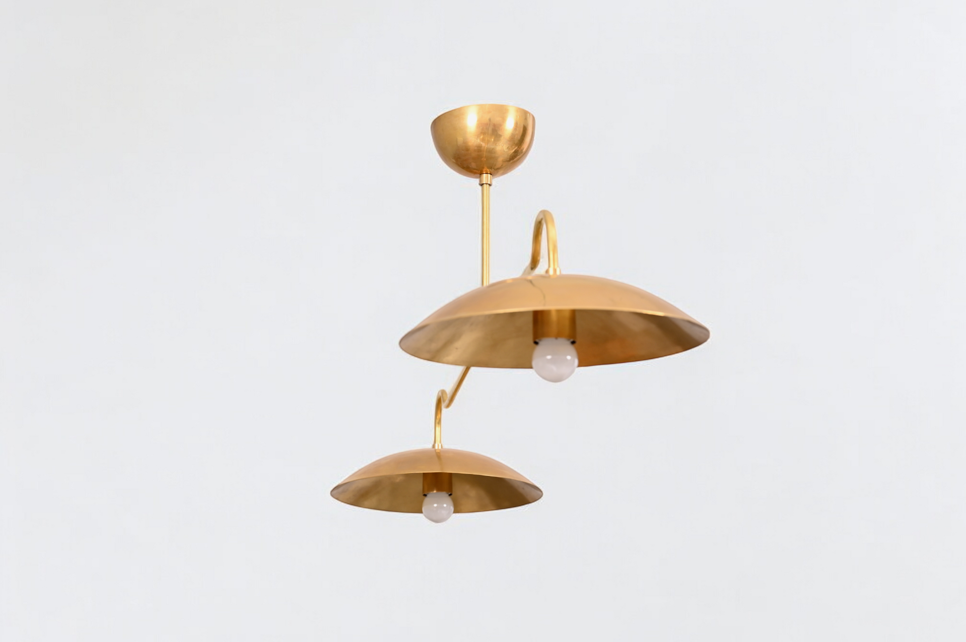 Brighten your space with the Mid Century 2-Light Raw Brass Sputnik Pendant