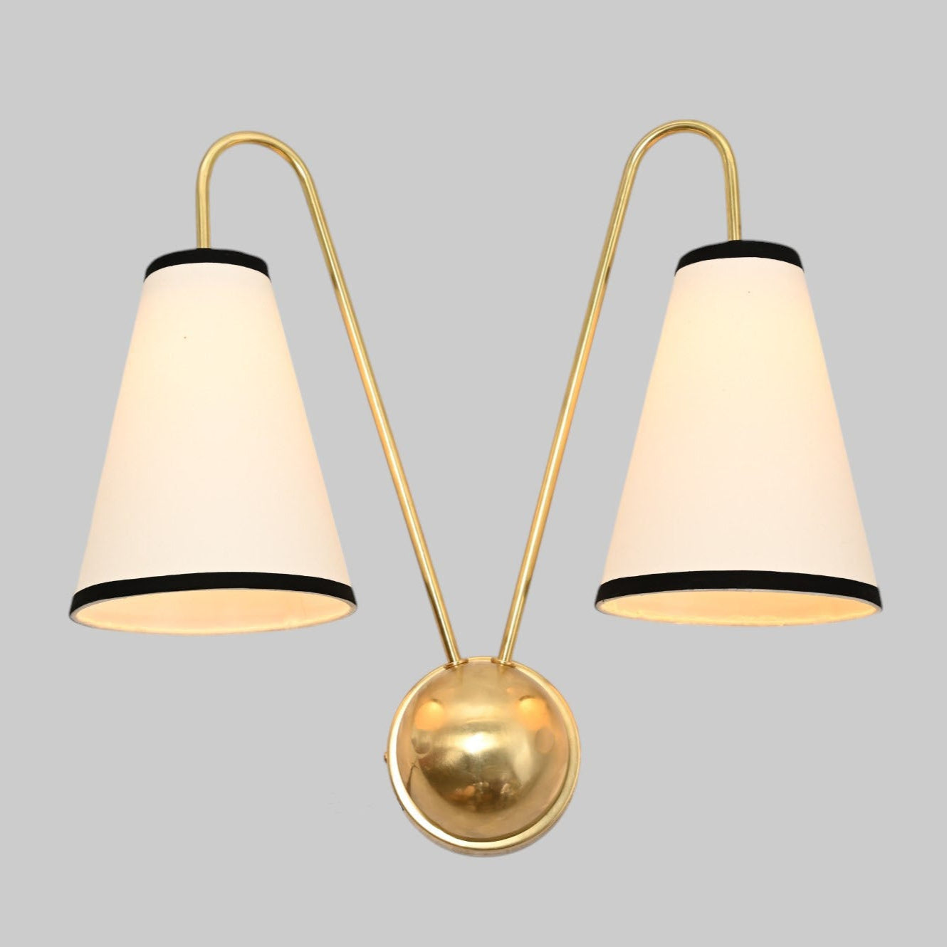 This handcrafted brass chandelier features unique finishes, adding beauty and uniqueness.