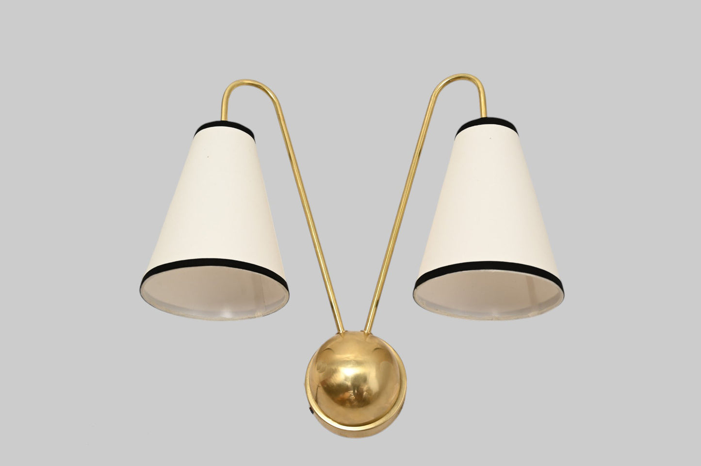 This handcrafted brass chandelier features unique finishes, adding beauty and uniqueness.