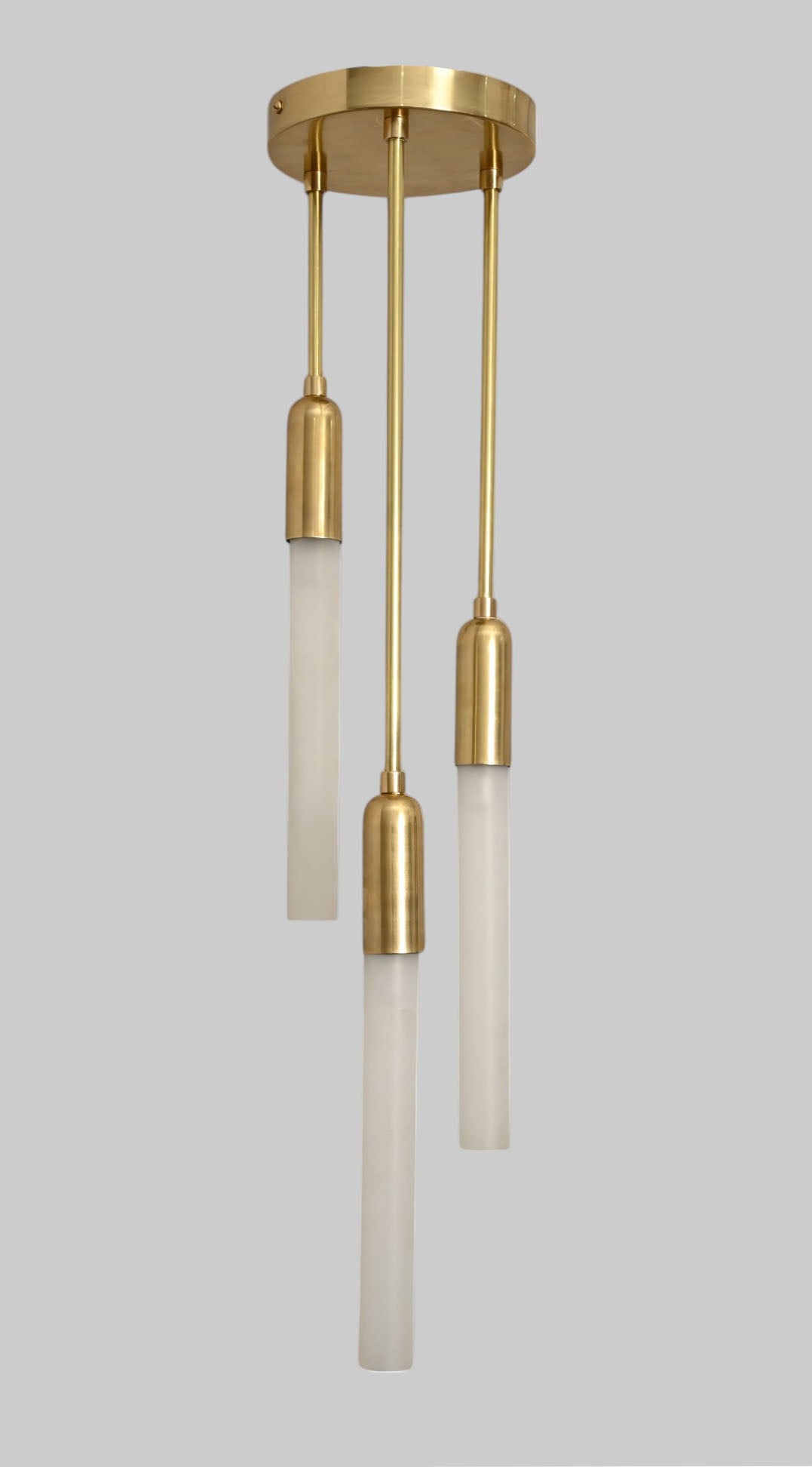 Glass Tube Ceiling Light in Raw Brass blends mid-century design with modern elegance