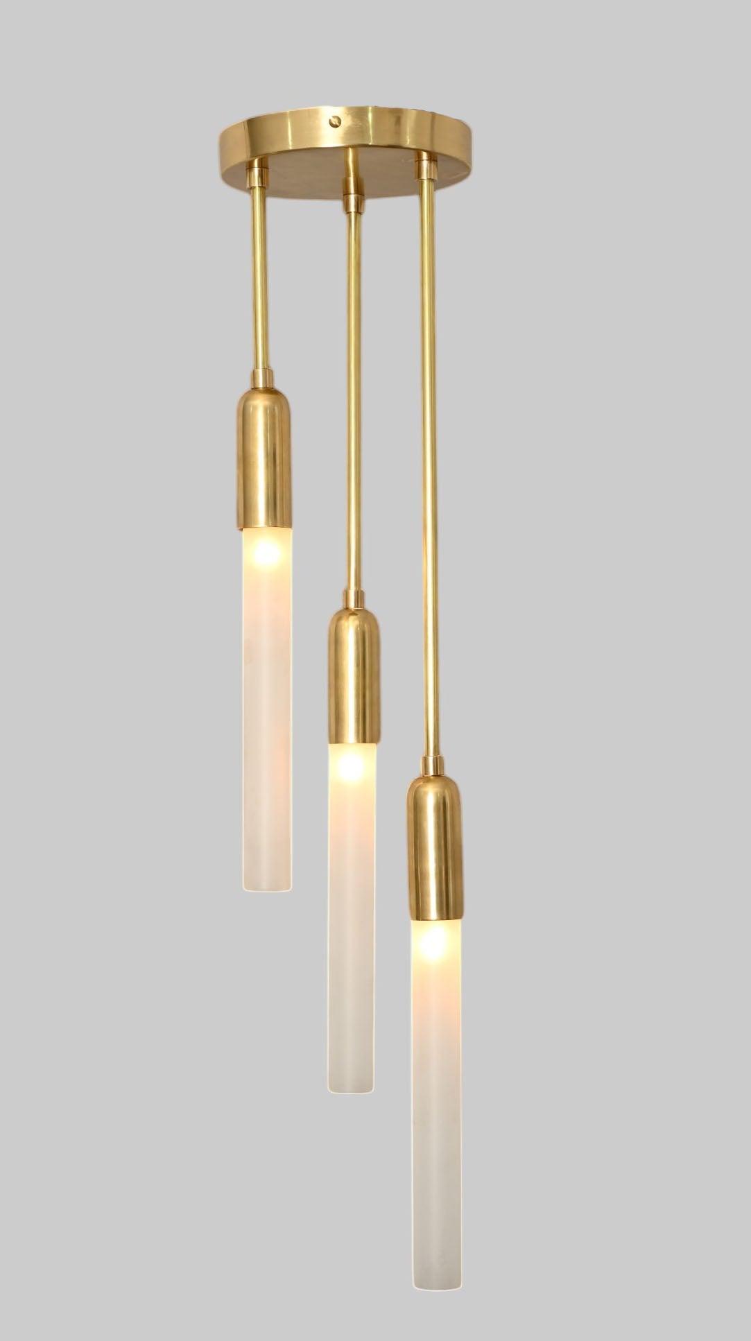 Glass Tube Ceiling Light in Raw Brass blends mid-century design with modern elegance