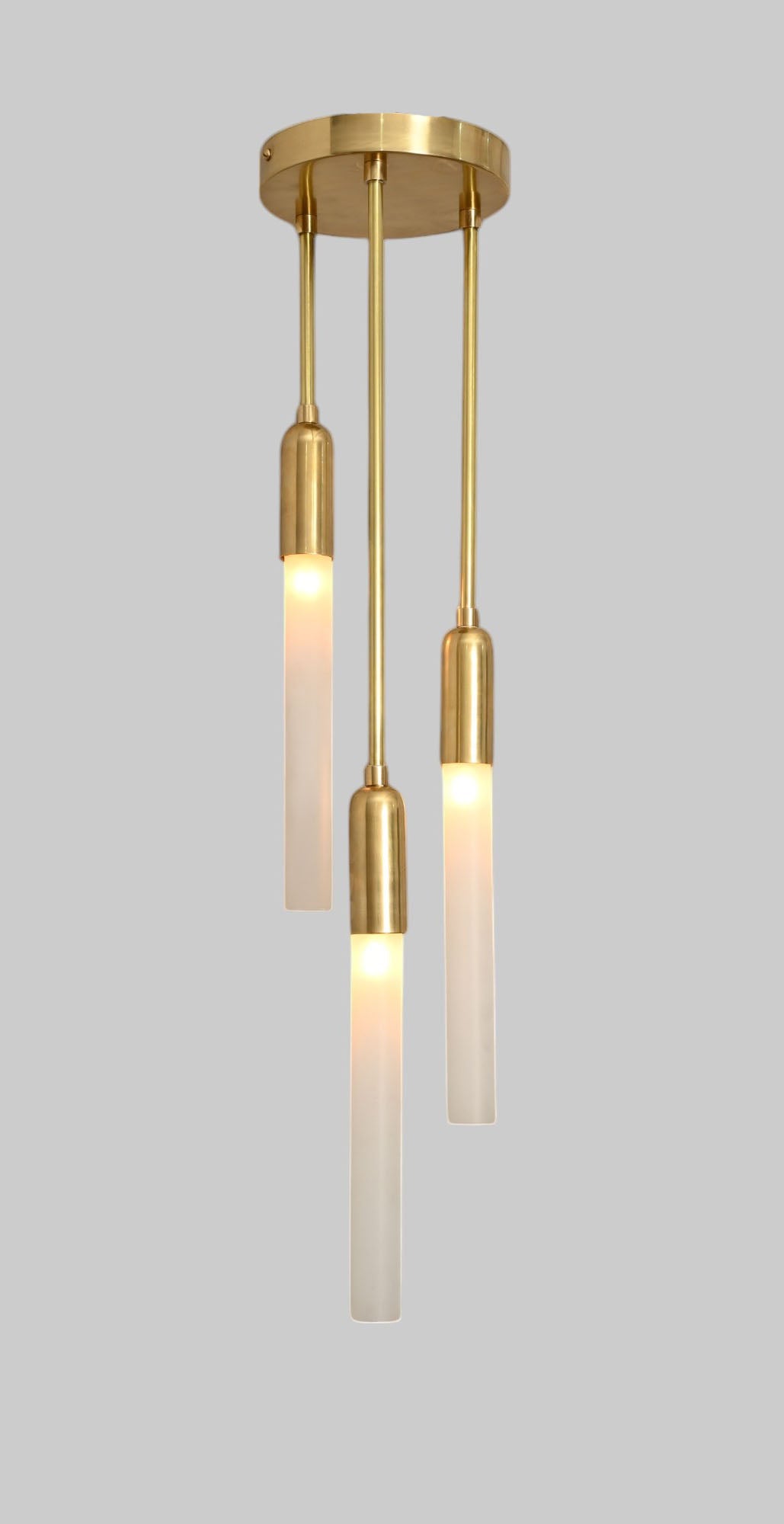 Glass Tube Ceiling Light in Raw Brass blends mid-century design with modern elegance