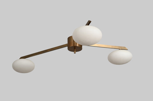Add retro charm with this 3-light globe Sputnik chandelier. Mid-century modern brass fixture, perfect for stylish ceilings