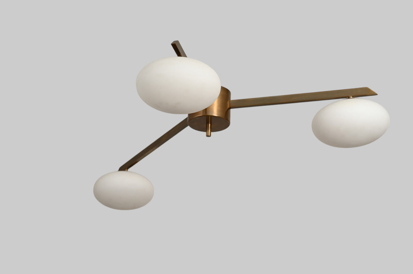 Add retro charm with this 3-light globe Sputnik chandelier. Mid-century modern brass fixture, perfect for stylish ceilings