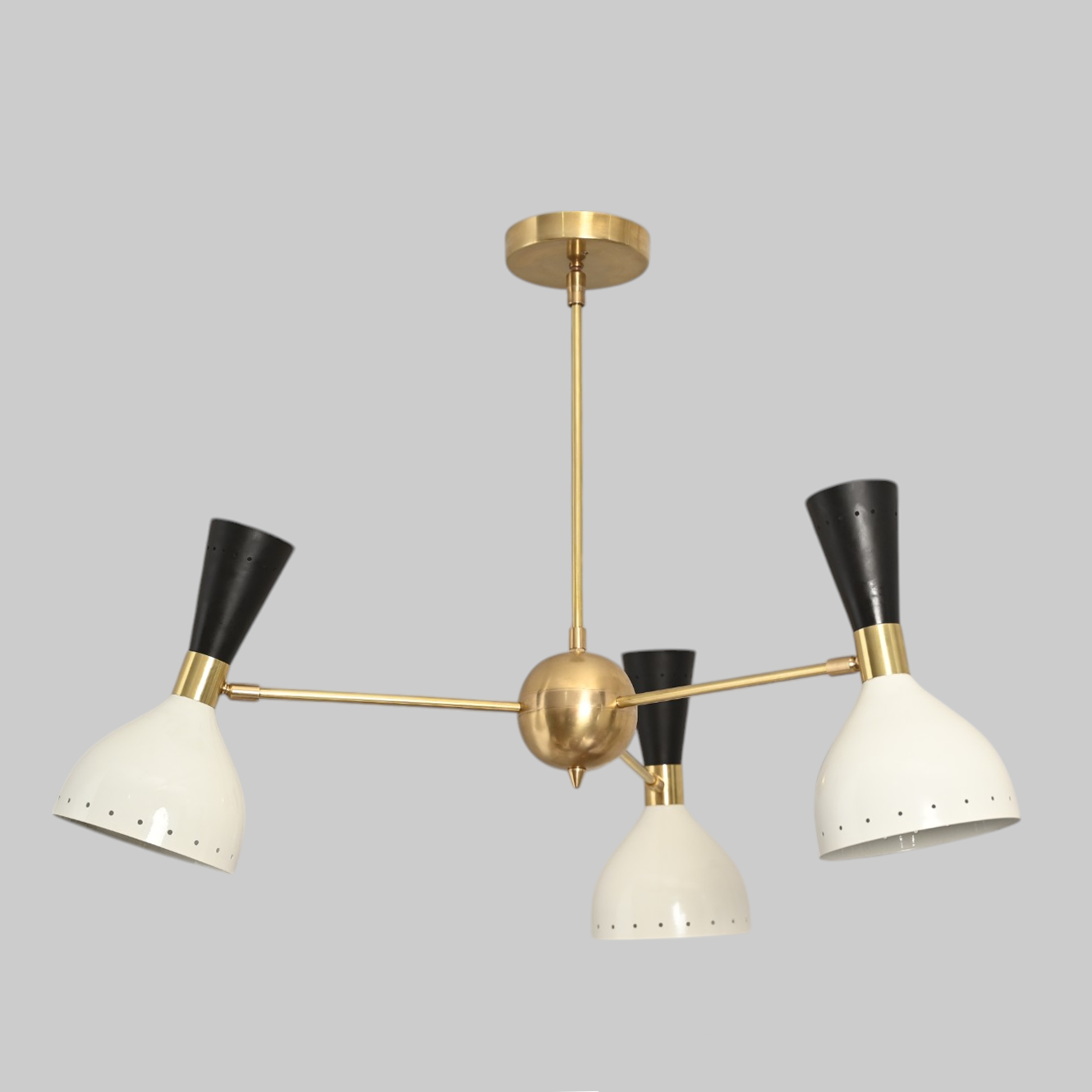 3 Shade Stilnovo lamp blends mid-century style with adjustable arms for flexible lighting