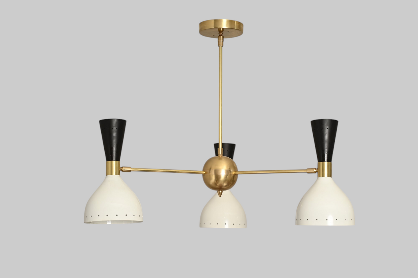 3 Shade Stilnovo lamp blends mid-century style with adjustable arms for flexible lighting