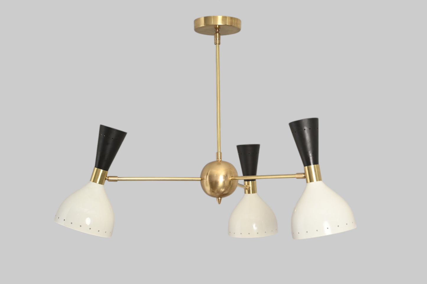 3 Shade Stilnovo lamp blends mid-century style with adjustable arms for flexible lighting