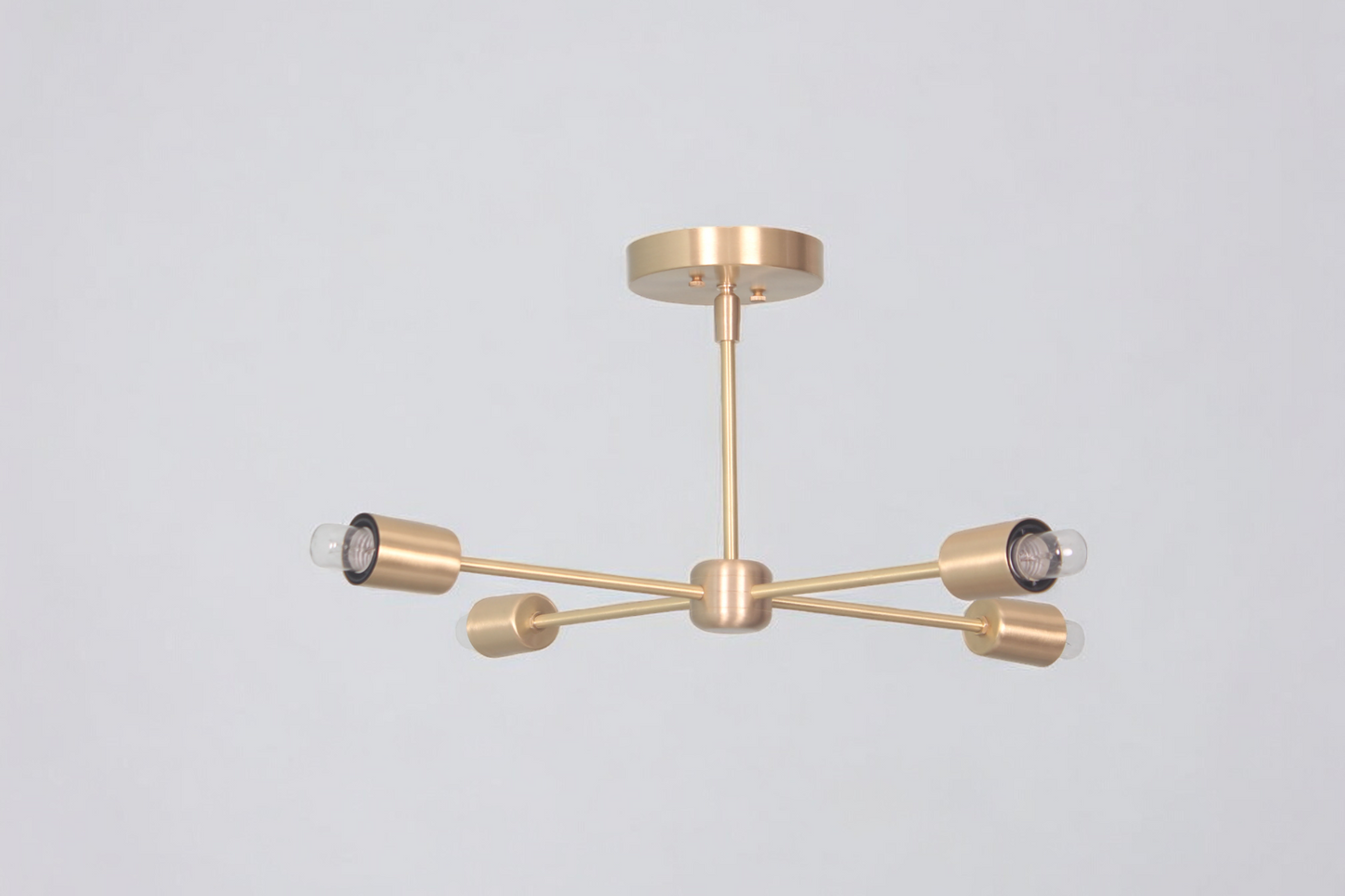 4 Arm Sputnik Chandelier combines industrial design with modern flair for bold style.