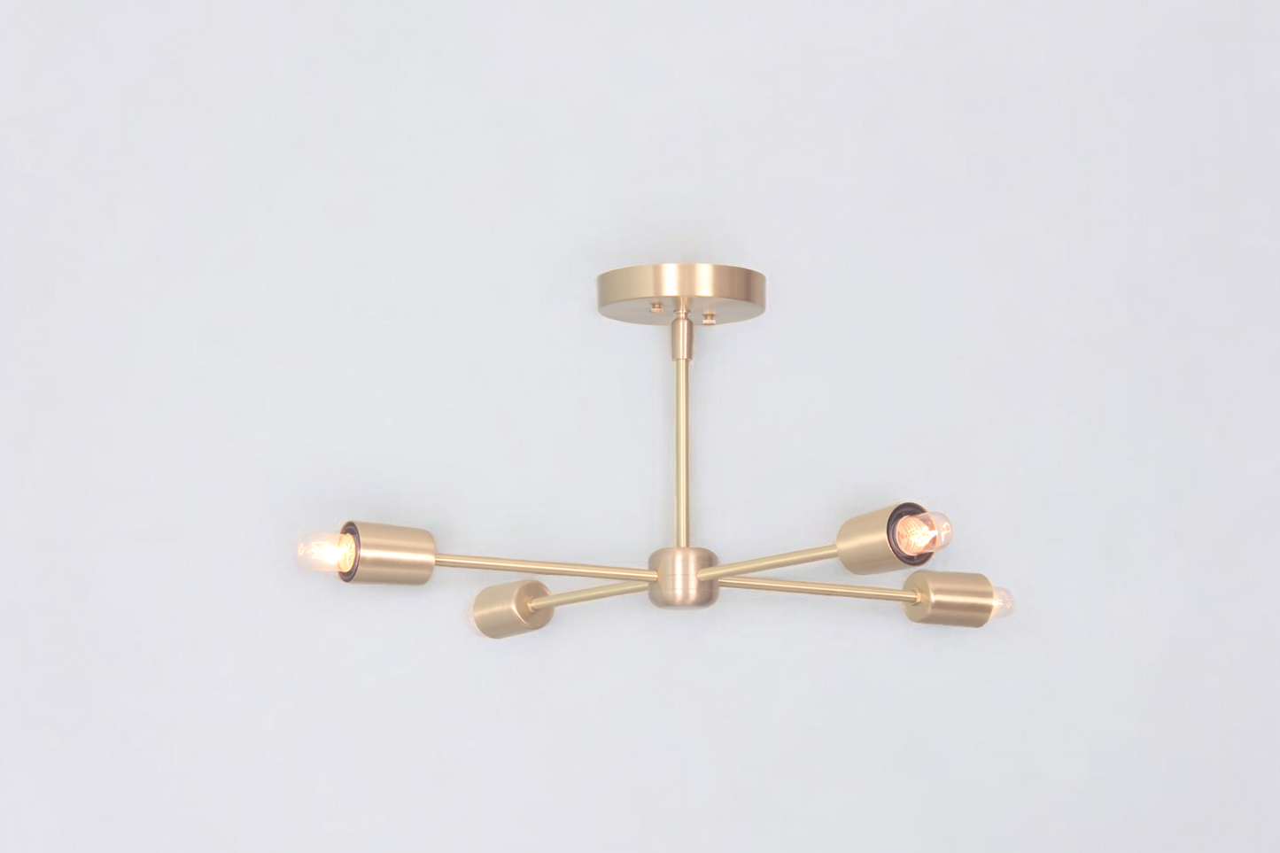 4 Arm Sputnik Chandelier combines industrial design with modern flair for bold style.