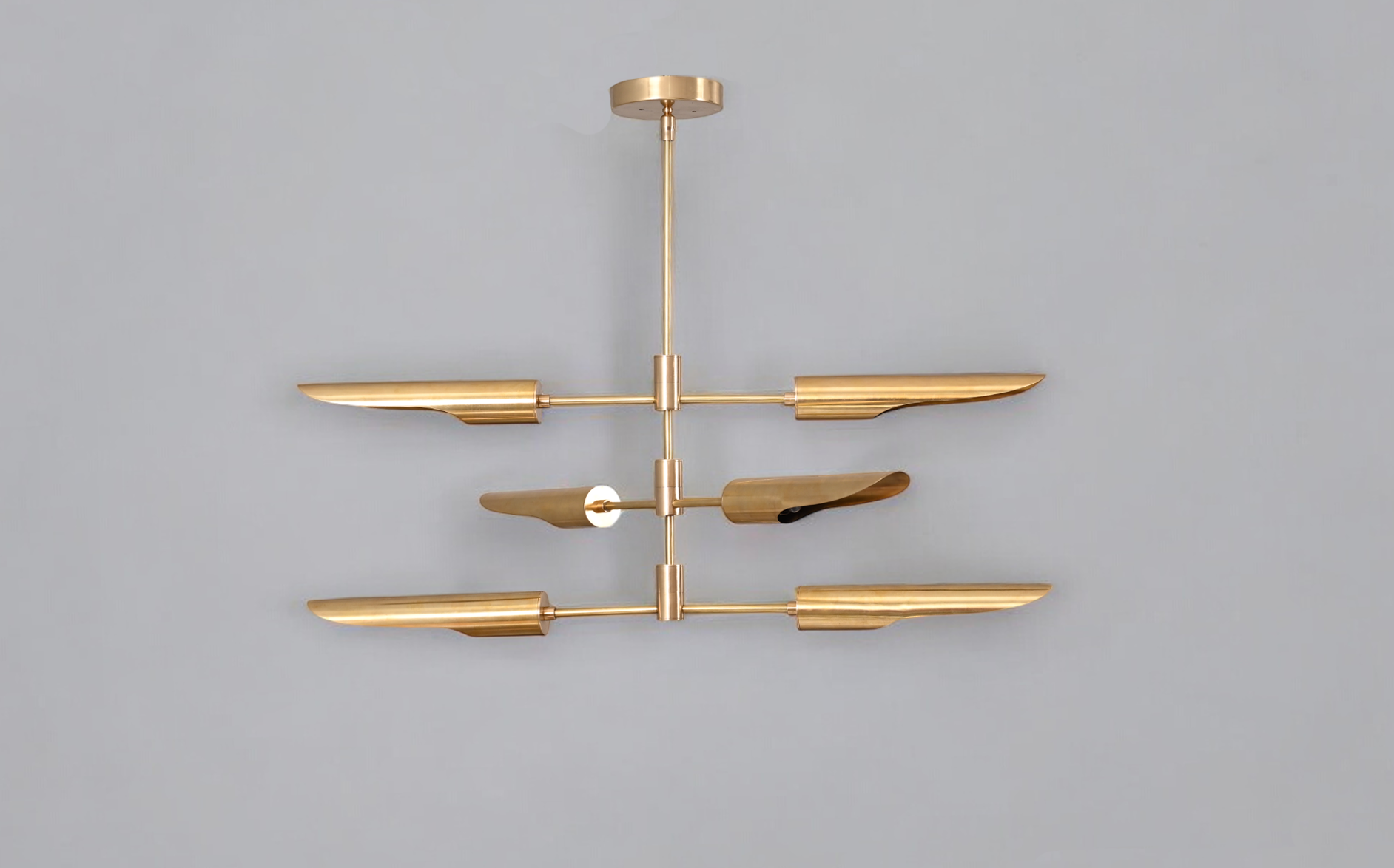 Enhance your decor with the Raw Brass Three Layer Shade Pendant Chandelier