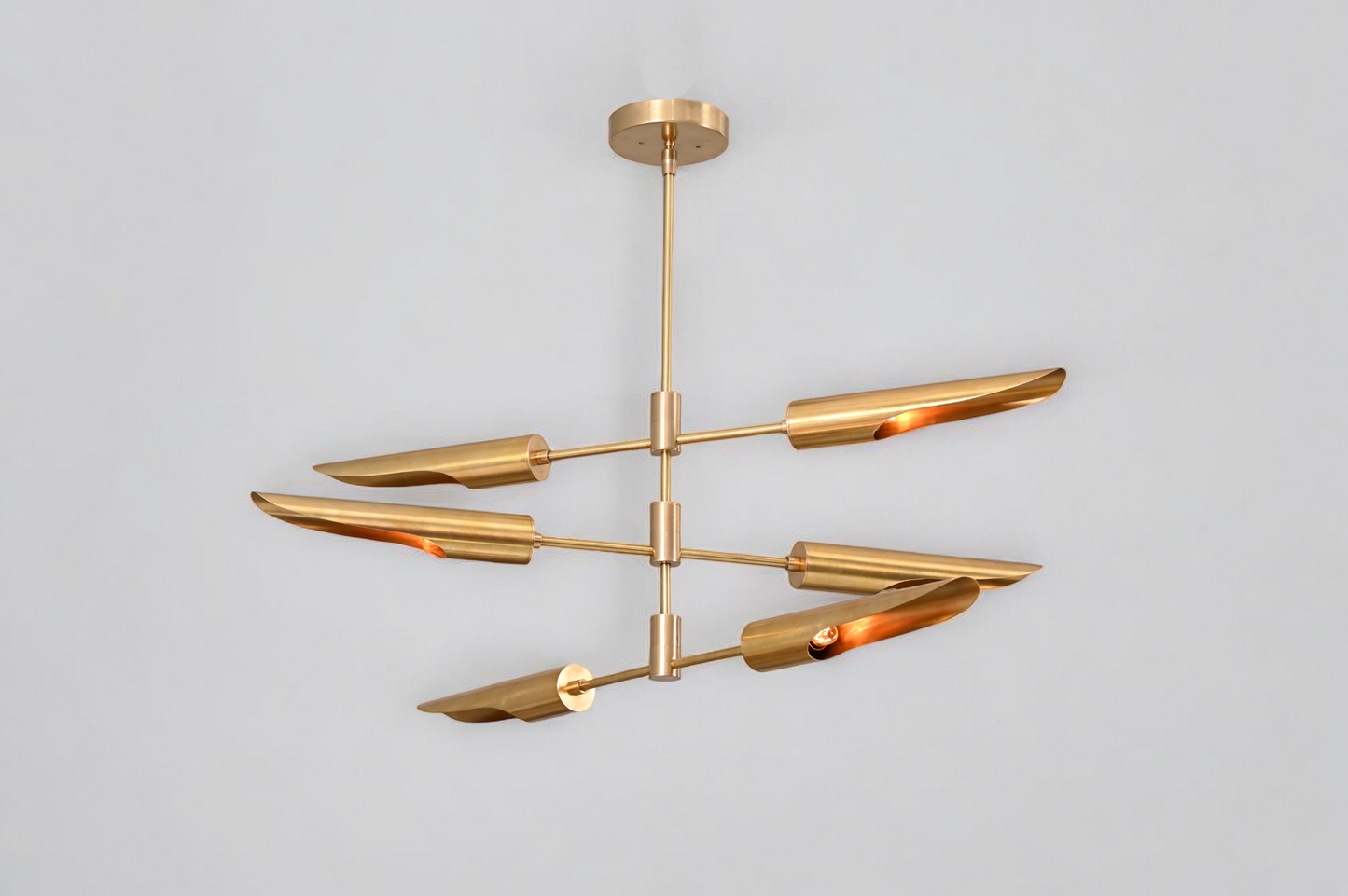 Enhance your decor with the Raw Brass Three Layer Shade Pendant Chandelier