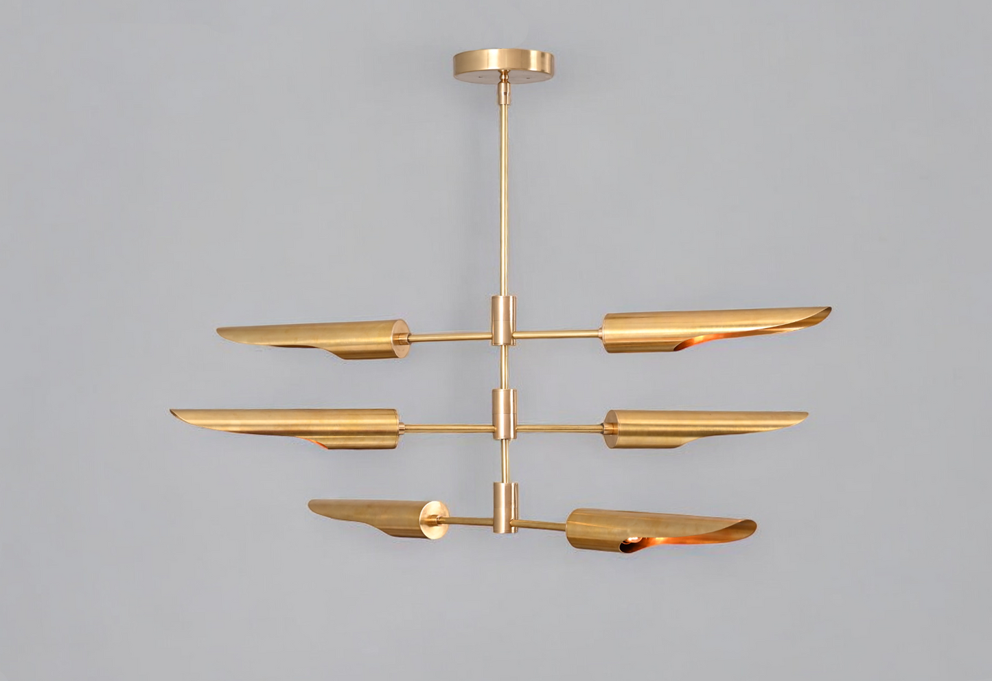 Enhance your decor with the Raw Brass Three Layer Shade Pendant Chandelier