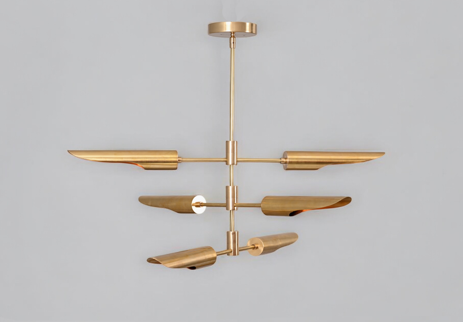 Enhance your decor with the Raw Brass Three Layer Shade Pendant Chandelier