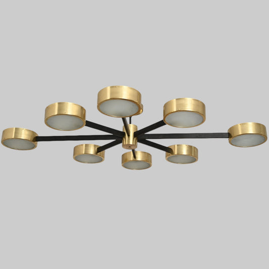 Handcrafted perforated brass chandelier with unique finish variations, full of charm