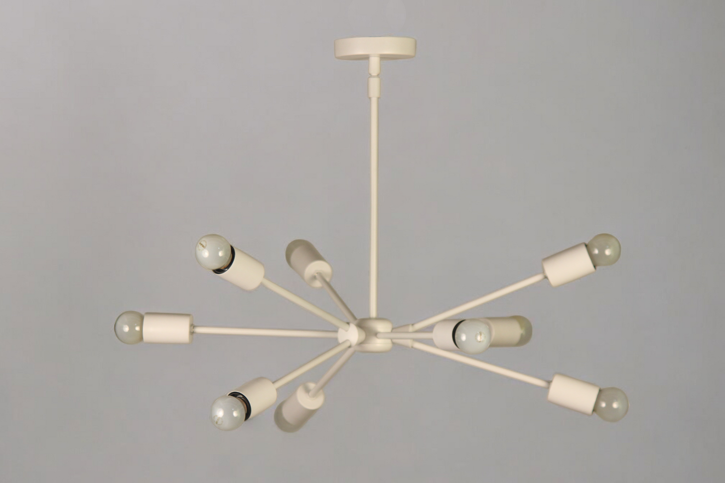 Elevate your space with this Mid-Century Modern Sputnik chandelier in sleek brass!