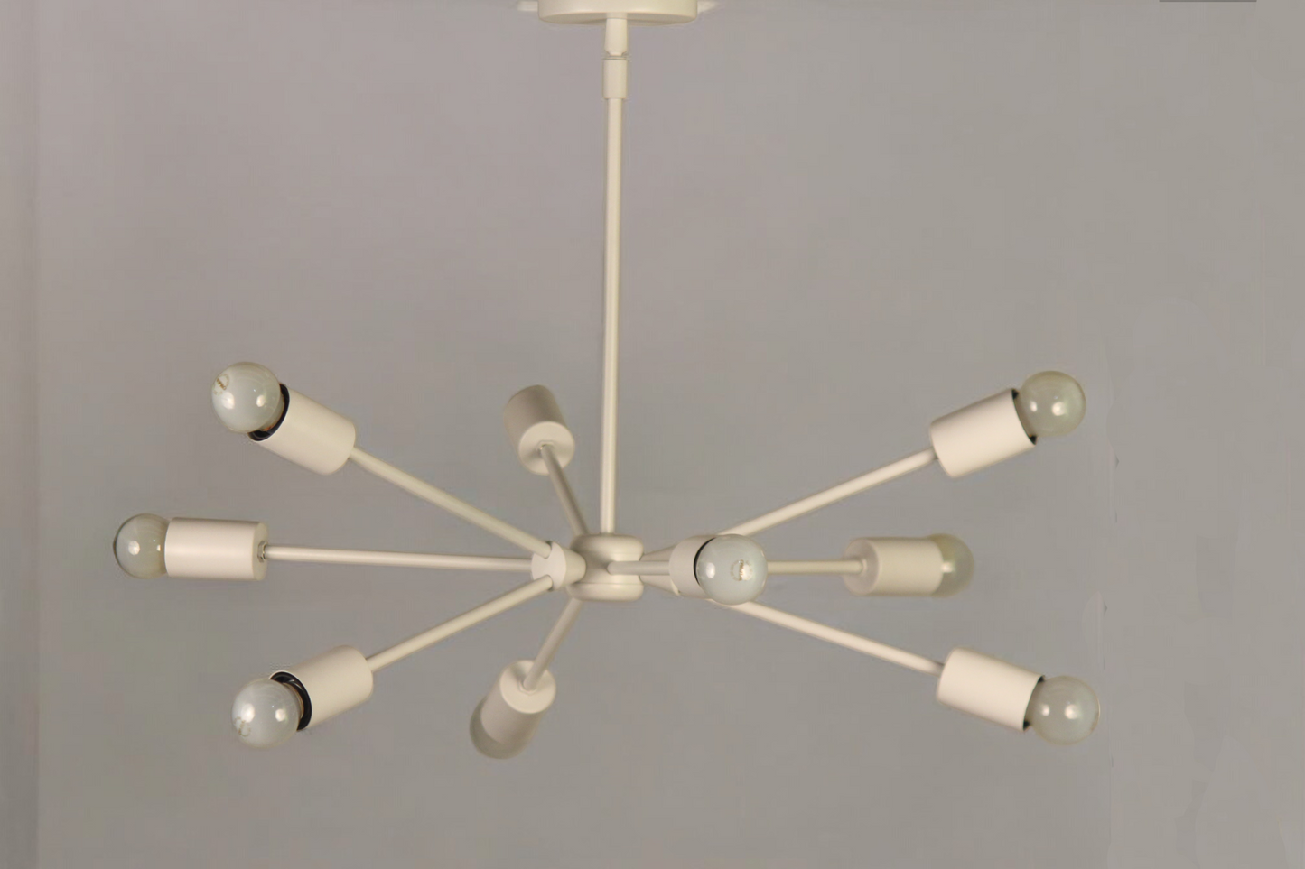 Elevate your space with this Mid-Century Modern Sputnik chandelier in sleek brass!