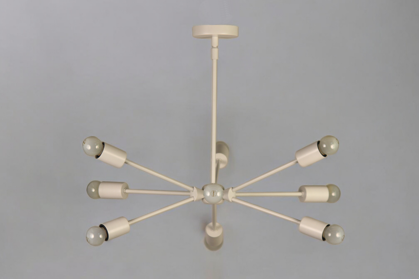 Elevate your space with this Mid-Century Modern Sputnik chandelier in sleek brass!