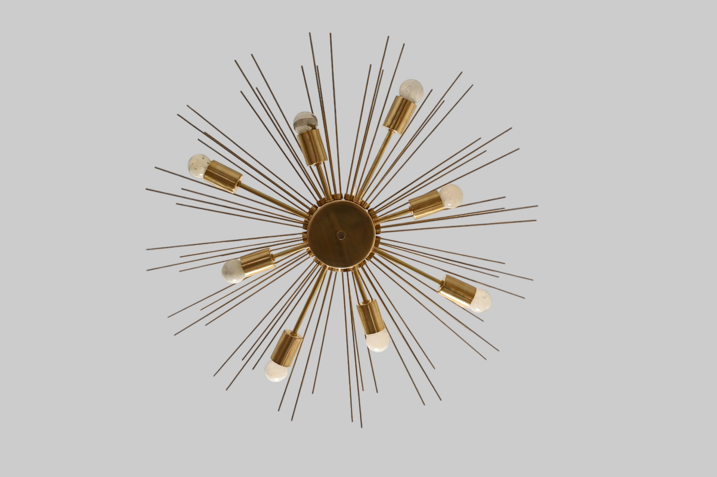 Modern Handmade Mid Century Raw Brass Sputnik Chandelier adds bold, vintage charm.