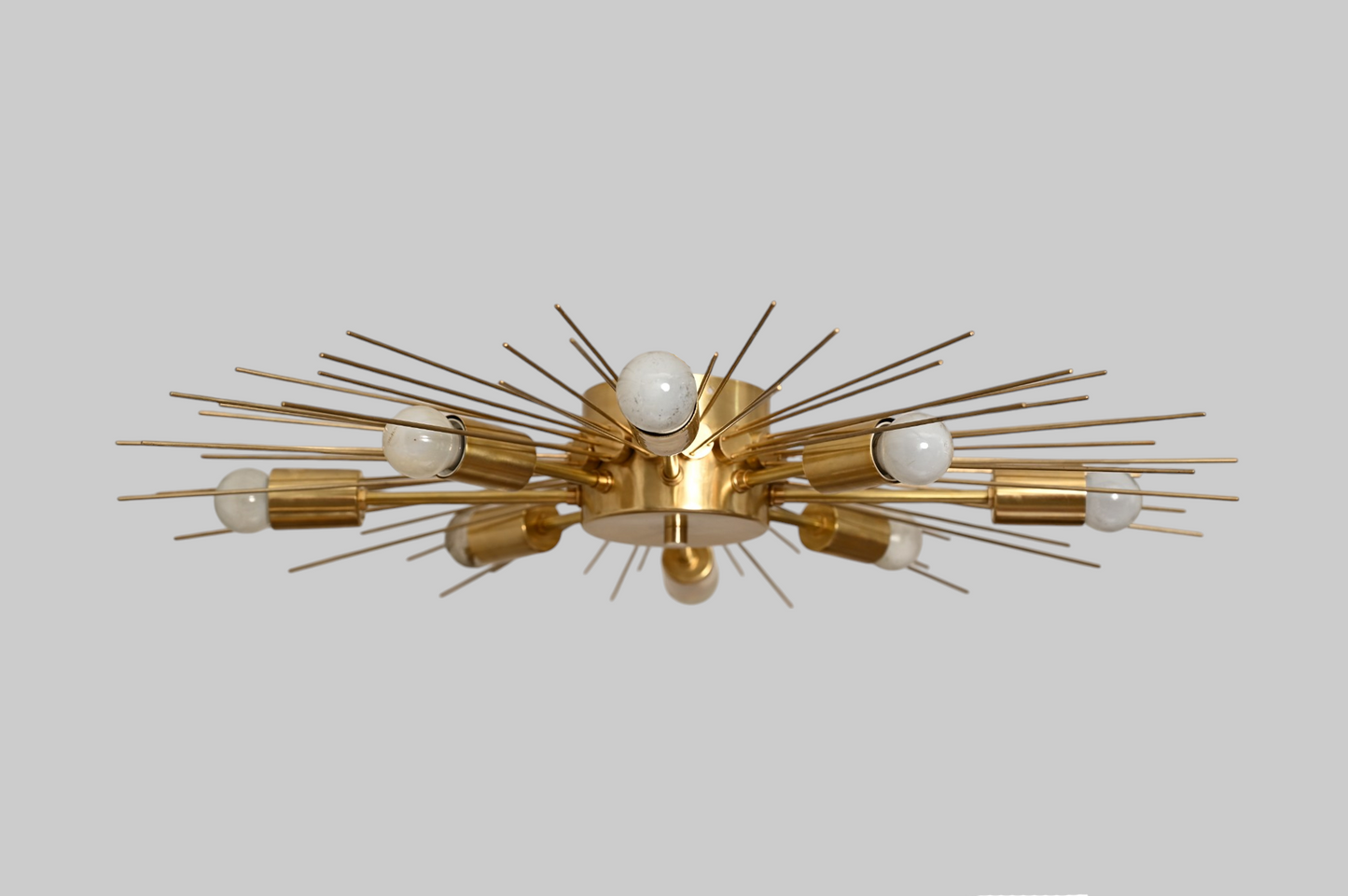 Modern Handmade Mid Century Raw Brass Sputnik Chandelier adds bold, vintage charm.