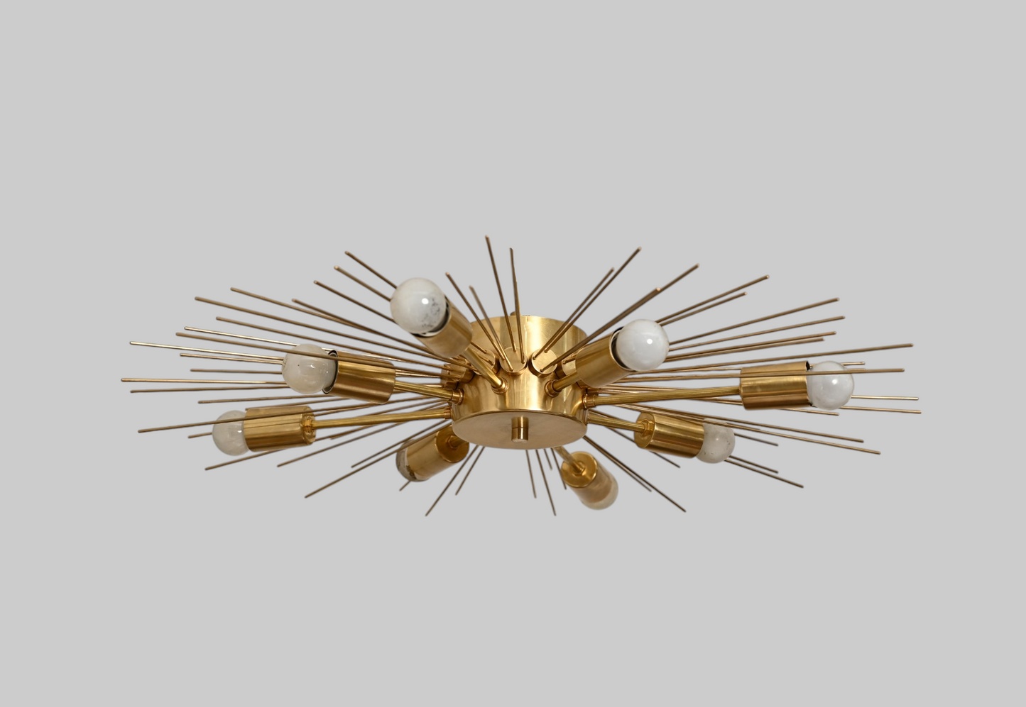 Modern Handmade Mid Century Raw Brass Sputnik Chandelier adds bold, vintage charm.