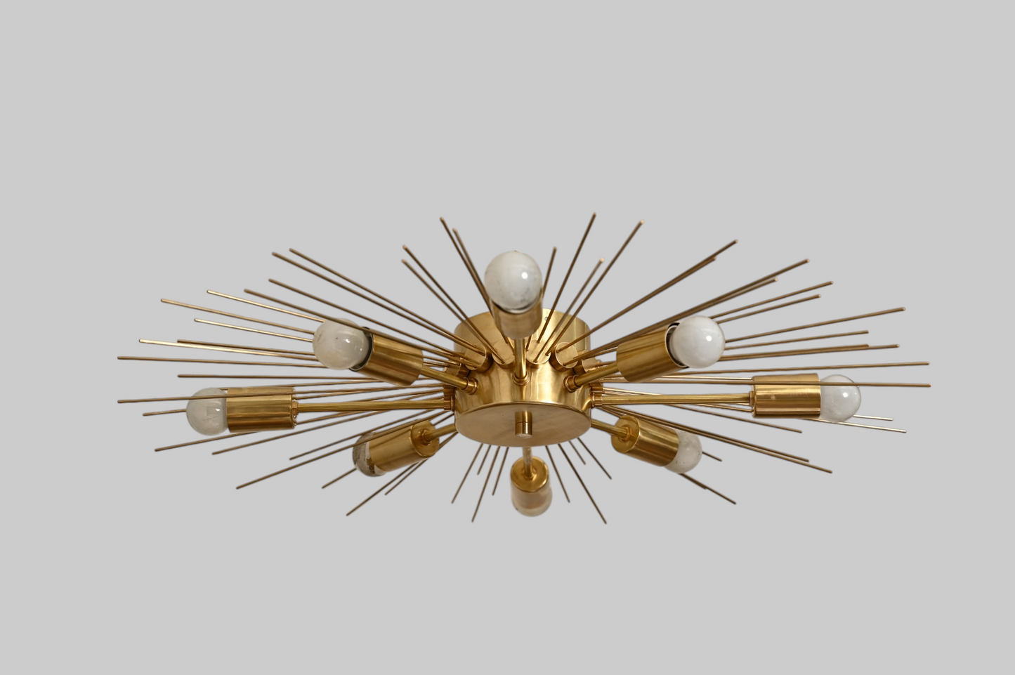 Modern Handmade Mid Century Raw Brass Sputnik Chandelier adds bold, vintage charm.