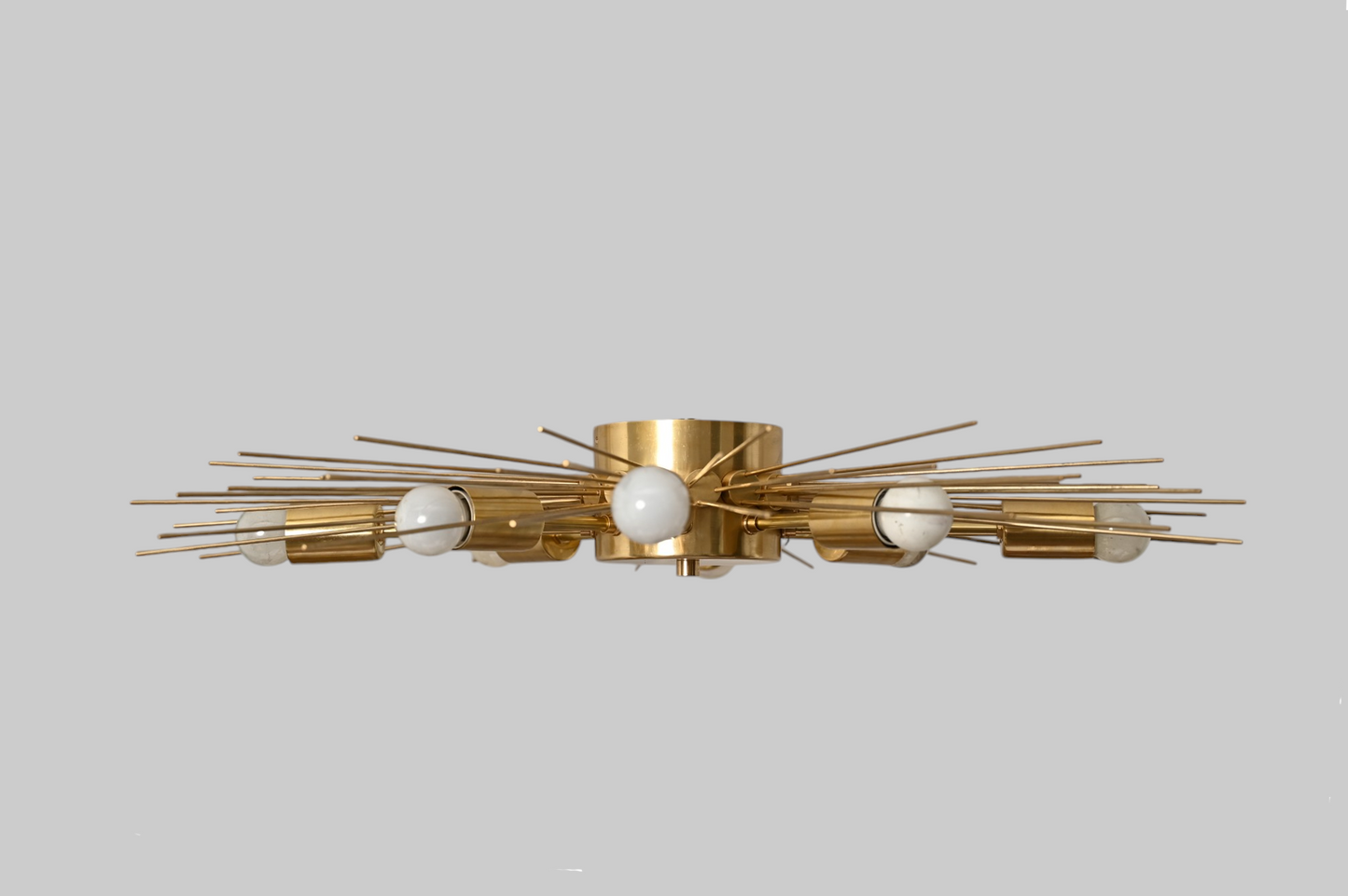 Modern Handmade Mid Century Raw Brass Sputnik Chandelier adds bold, vintage charm.