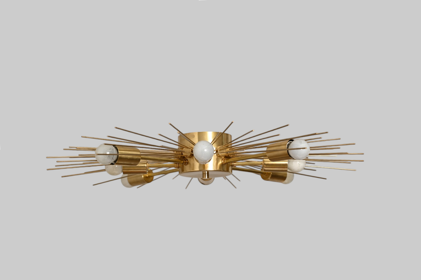 Modern Handmade Mid Century Raw Brass Sputnik Chandelier adds bold, vintage charm.