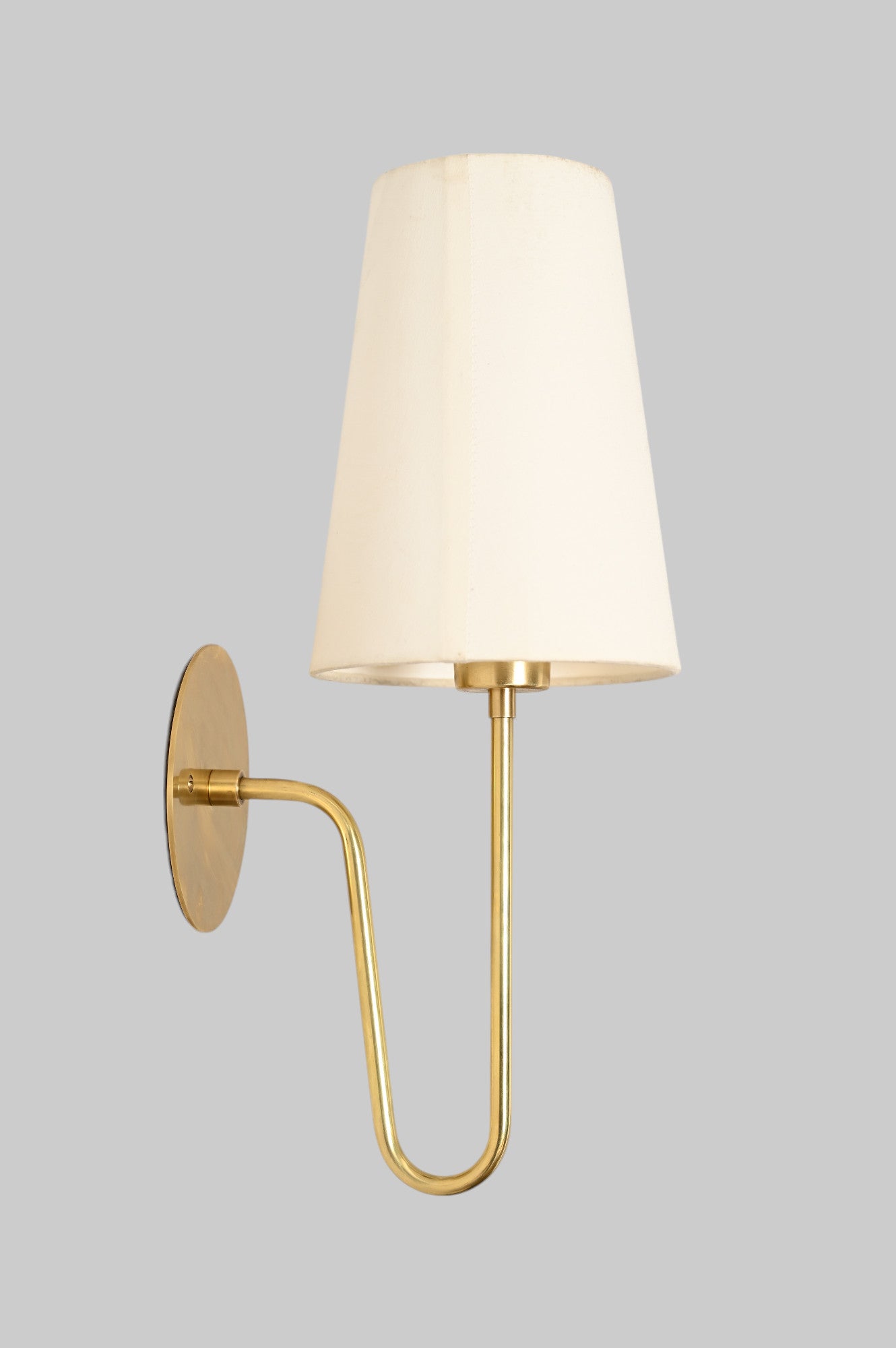 Aged Brass 'Scoop Sconce' offers sleek, stylish lighting with Mid Century design