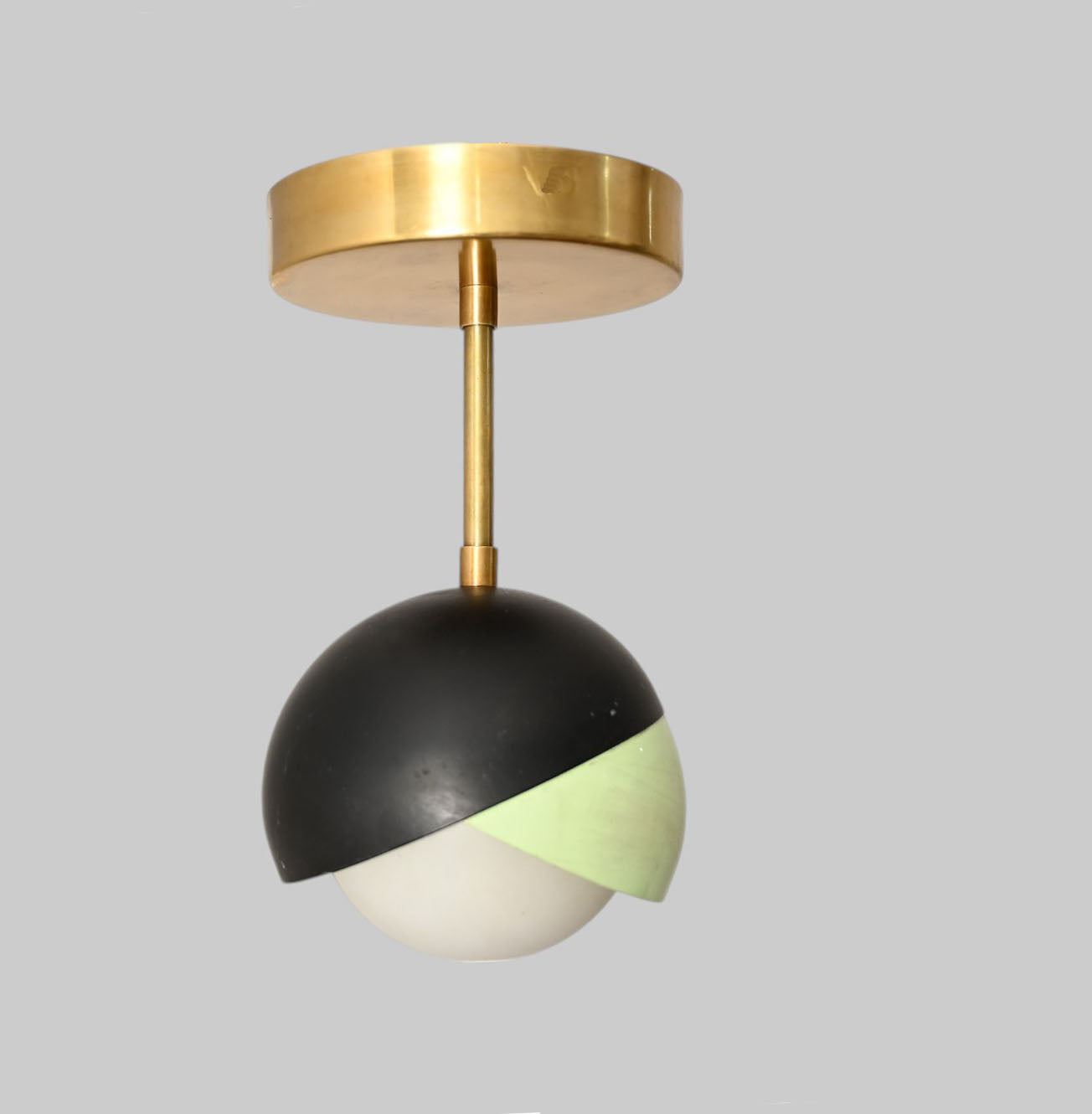 The 1-Light Mid-Century Ceiling Lamp features sleek design and retro flair for style