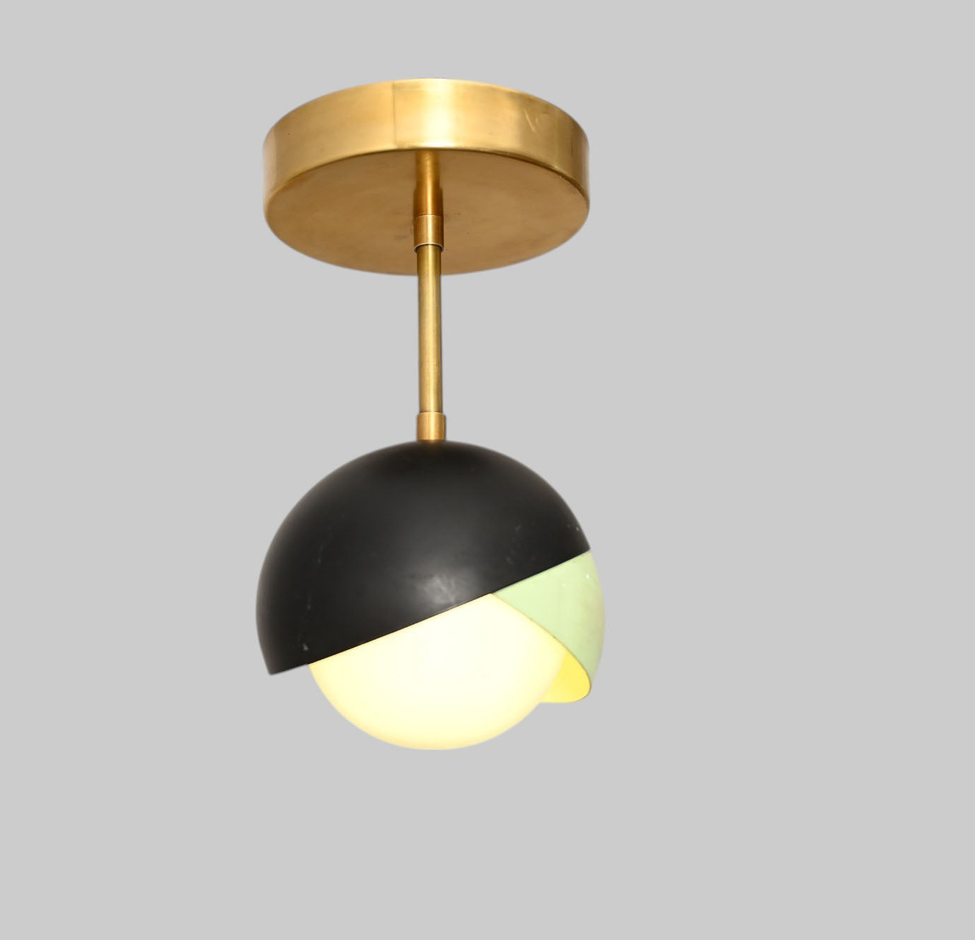 The 1-Light Mid-Century Ceiling Lamp features sleek design and retro flair for style