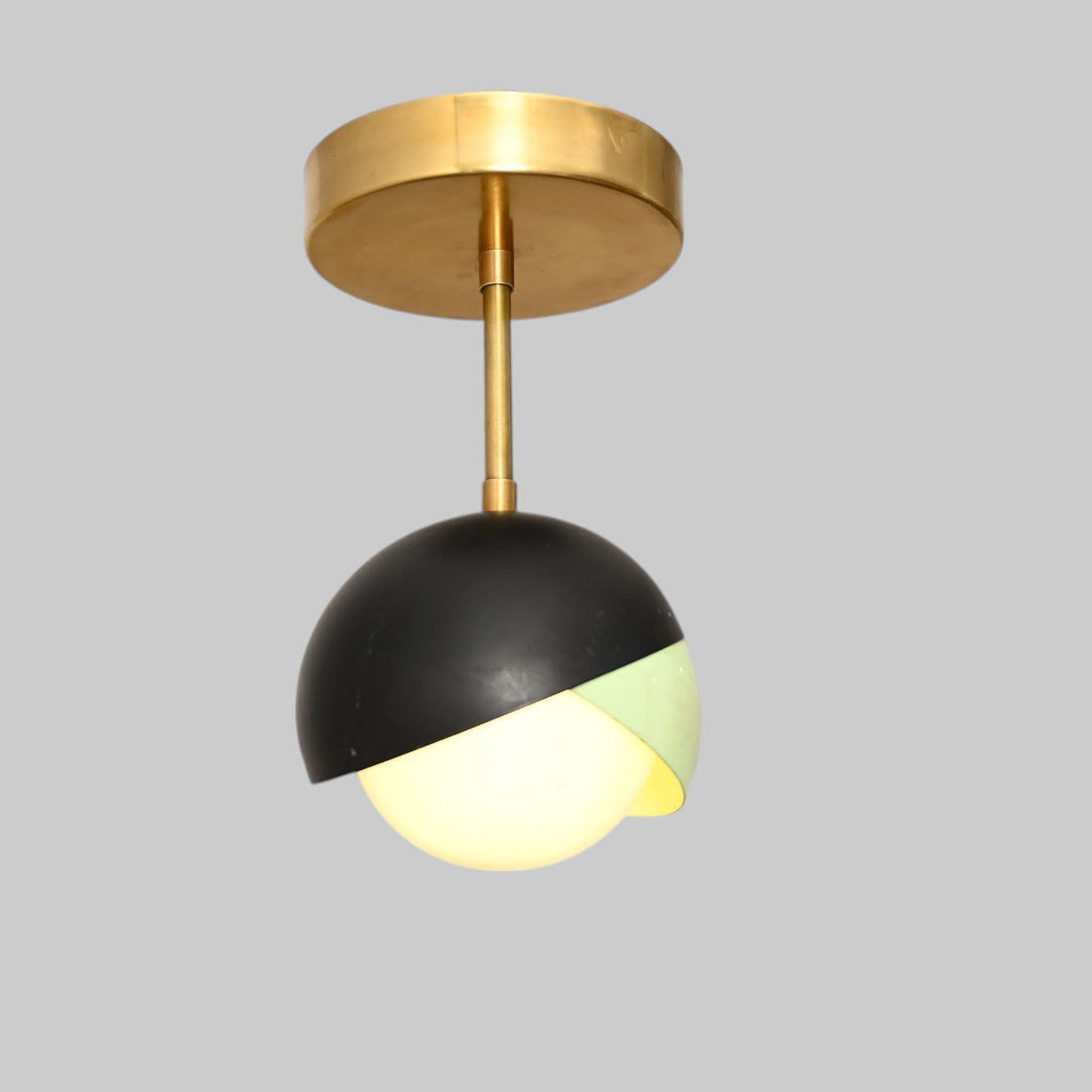 The 1-Light Mid-Century Ceiling Lamp features sleek design and retro flair for style