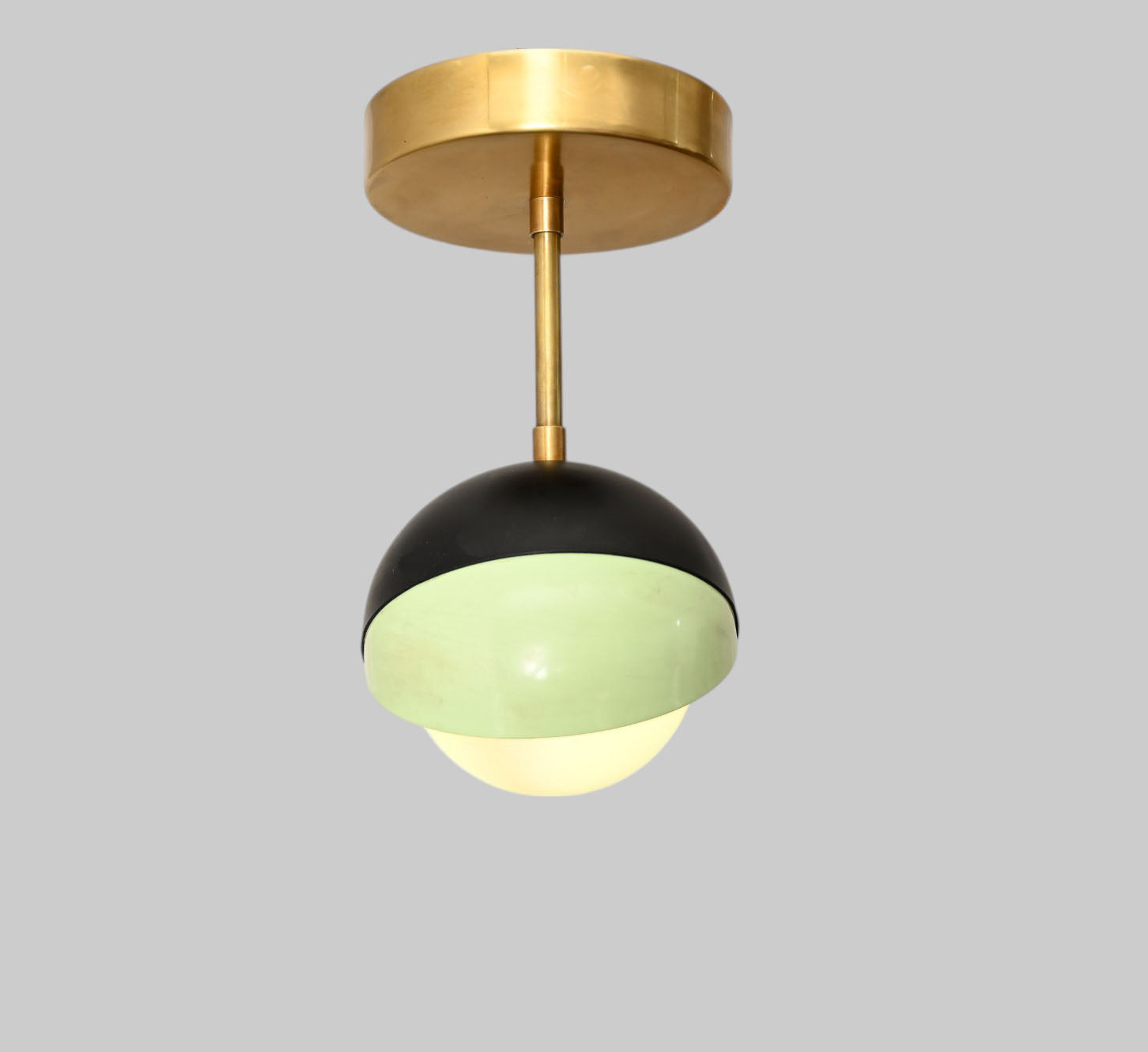 The 1-Light Mid-Century Ceiling Lamp features sleek design and retro flair for style