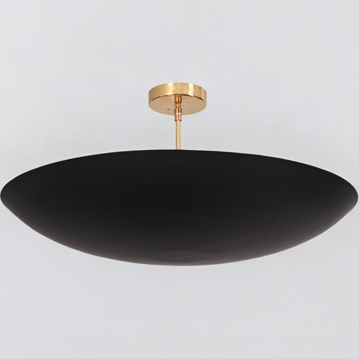 Add modern flair with a 6 Light Flush Mount Pendant, mid-century raw brass Sputnik design