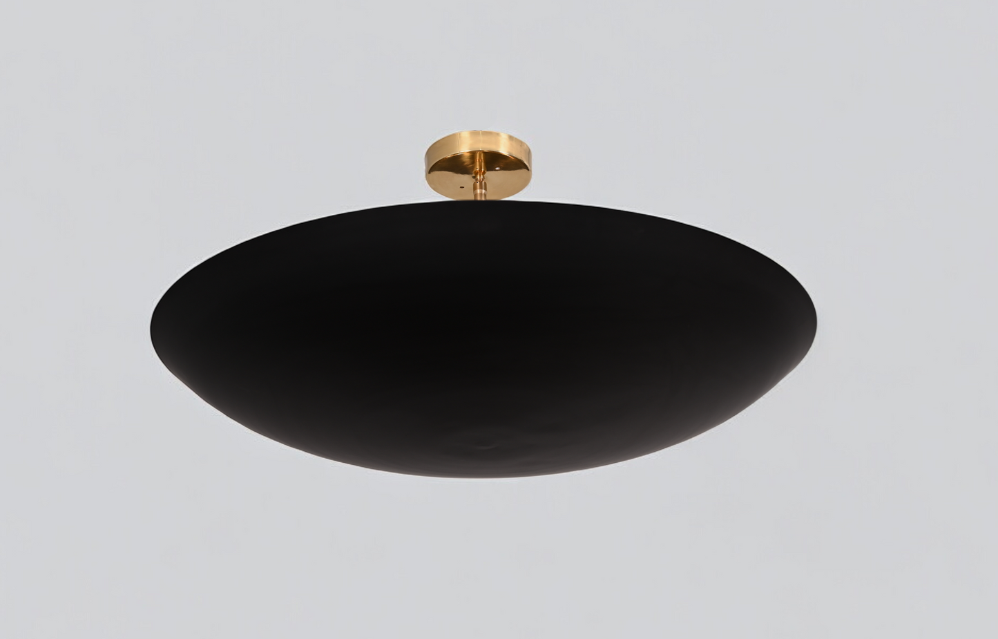 Add modern flair with a 6 Light Flush Mount Pendant, mid-century raw brass Sputnik design