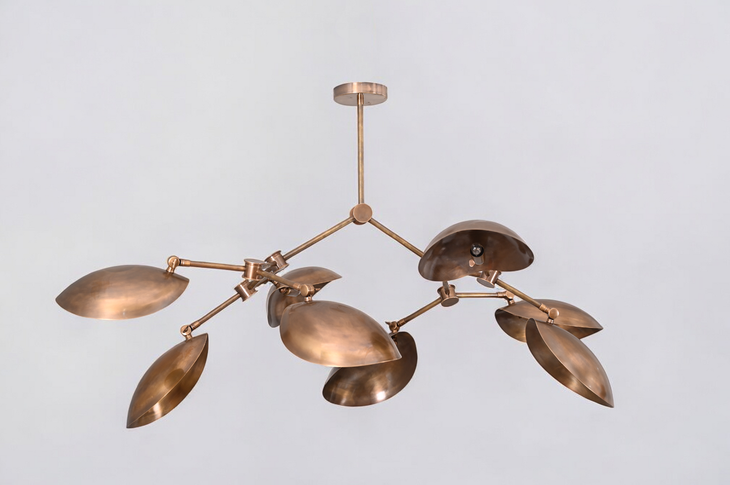 Brighten your space with the 8 Shade Light Mid Century Linear Brass Sputnik Chandelier