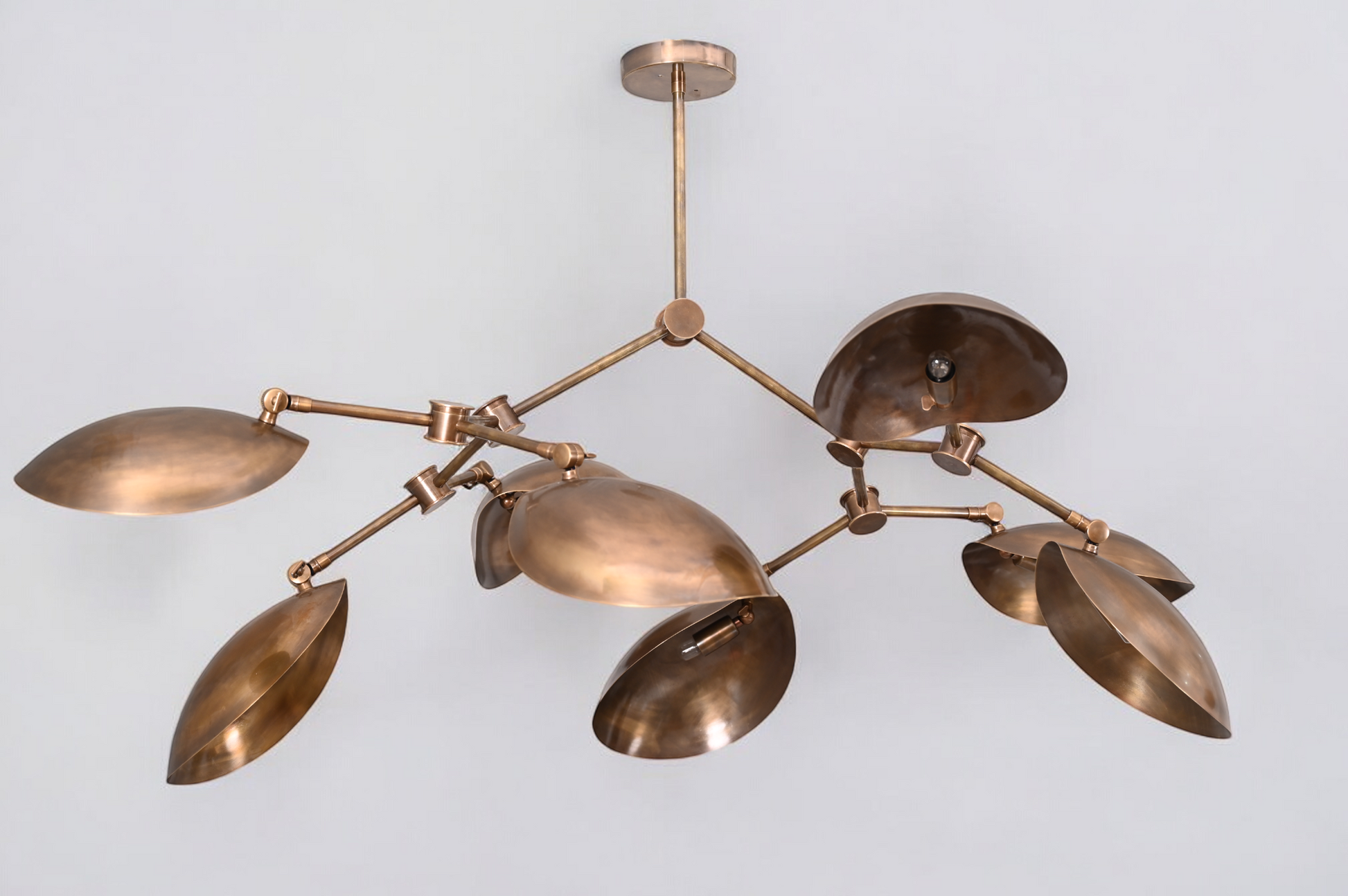 Brighten your space with the 8 Shade Light Mid Century Linear Brass Sputnik Chandelier