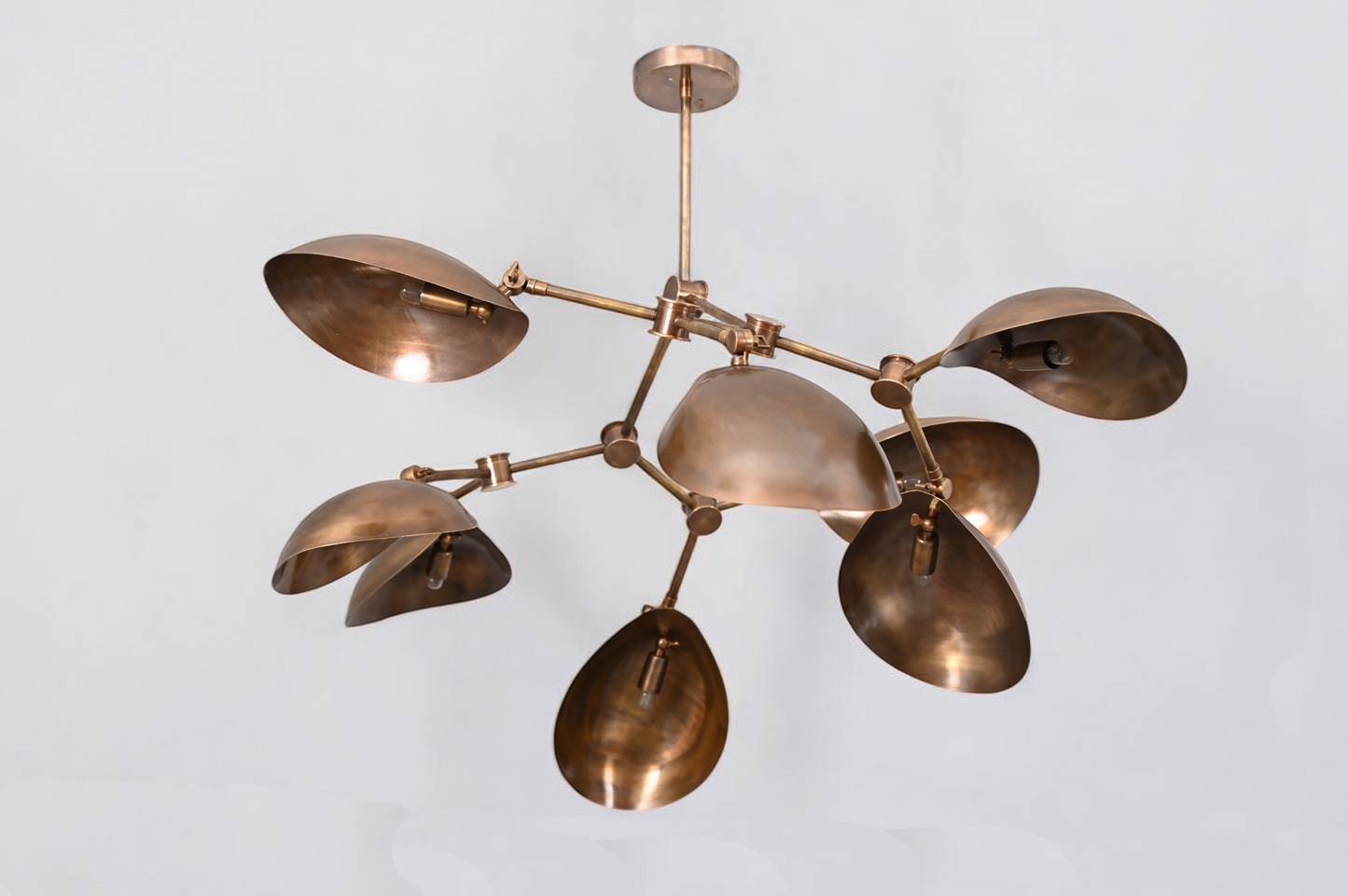 Brighten your space with the 8 Shade Light Mid Century Linear Brass Sputnik Chandelier