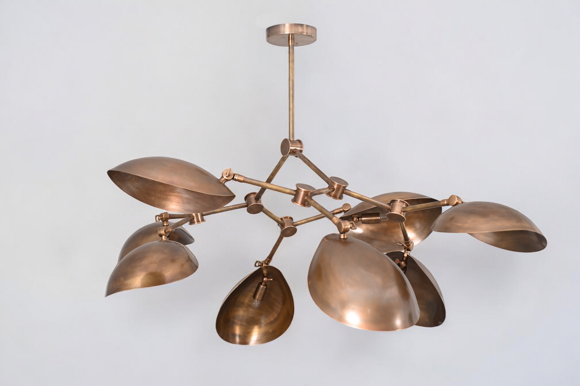 Brighten your space with the 8 Shade Light Mid Century Linear Brass Sputnik Chandelier