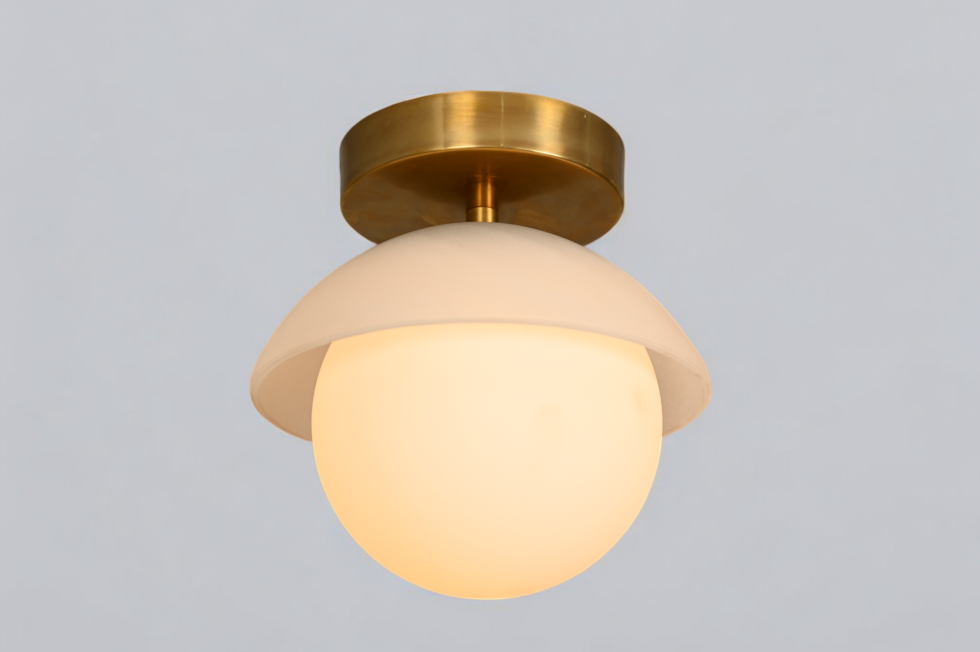 Brighten your space with the Mid-Century Brass Sputnik Ceiling Light and glass cone