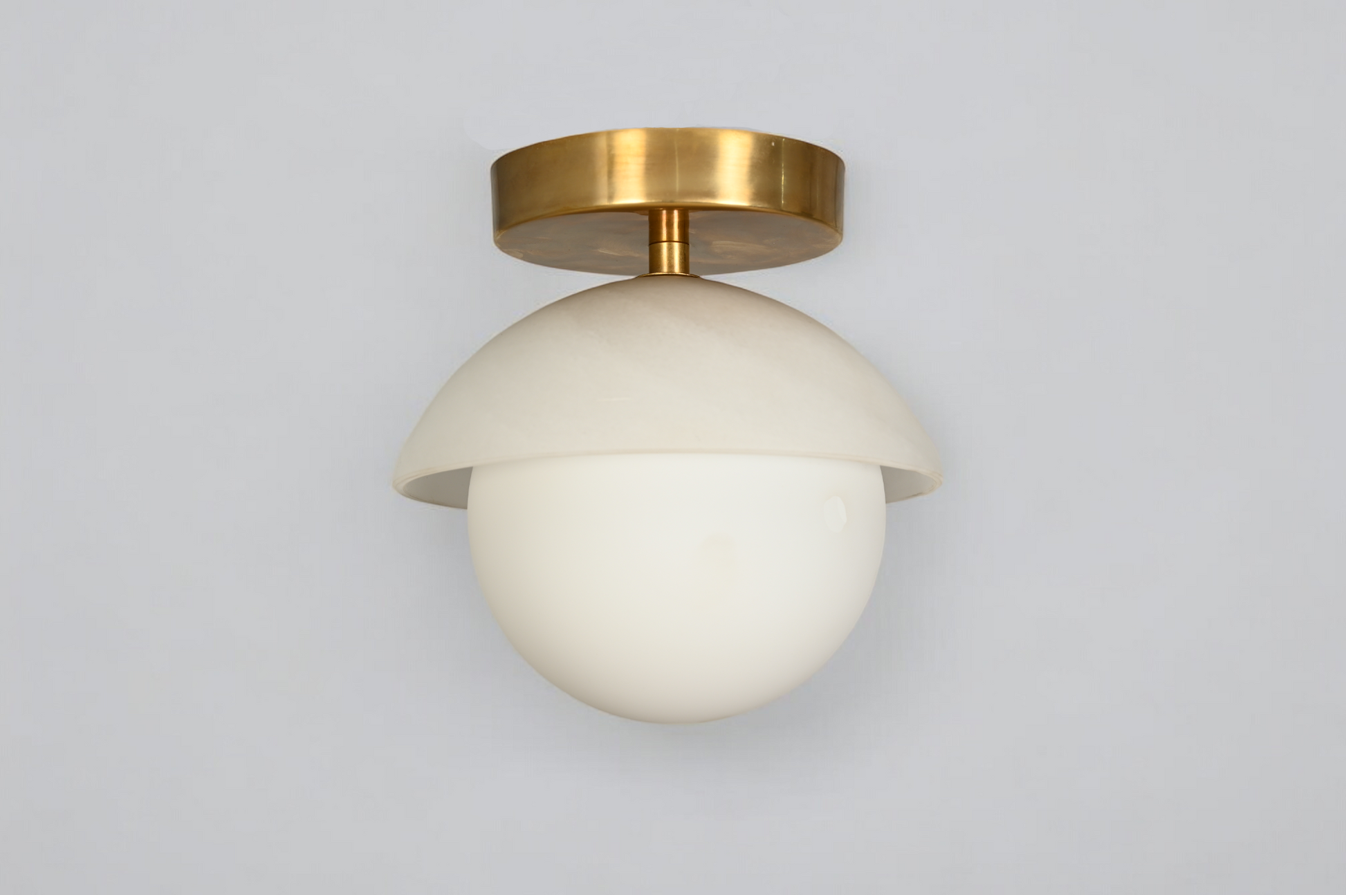 Brighten your space with the Mid-Century Brass Sputnik Ceiling Light and glass cone