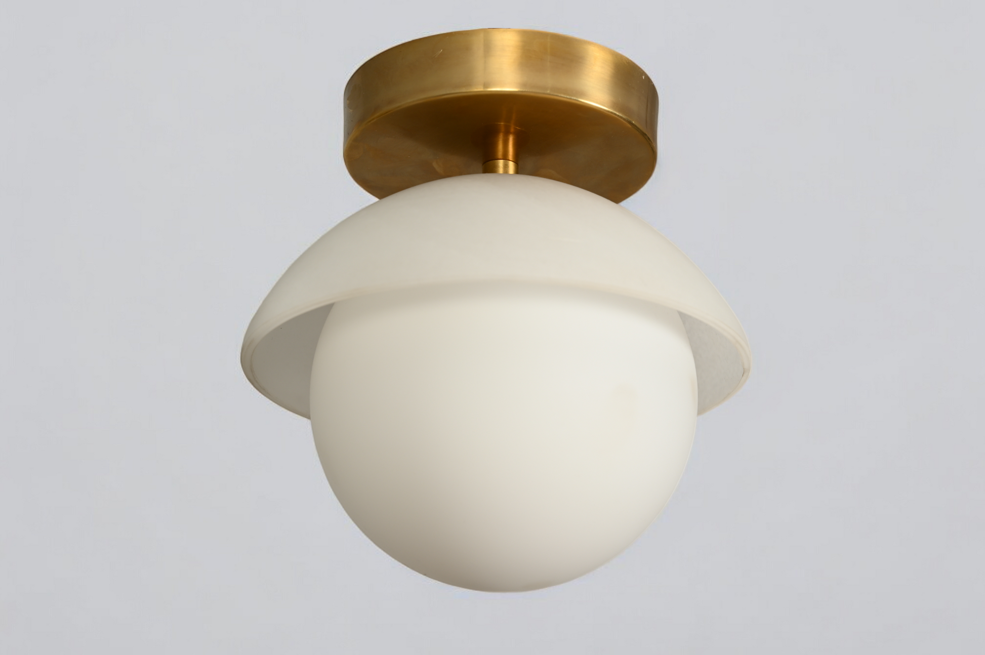 Brighten your space with the Mid-Century Brass Sputnik Ceiling Light and glass cone