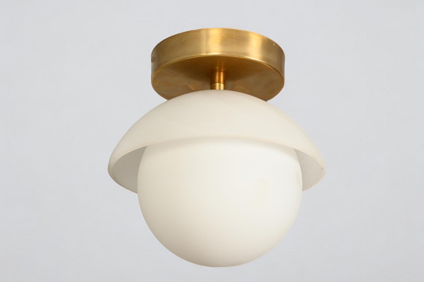 Brighten your space with the Mid-Century Brass Sputnik Ceiling Light and glass cone