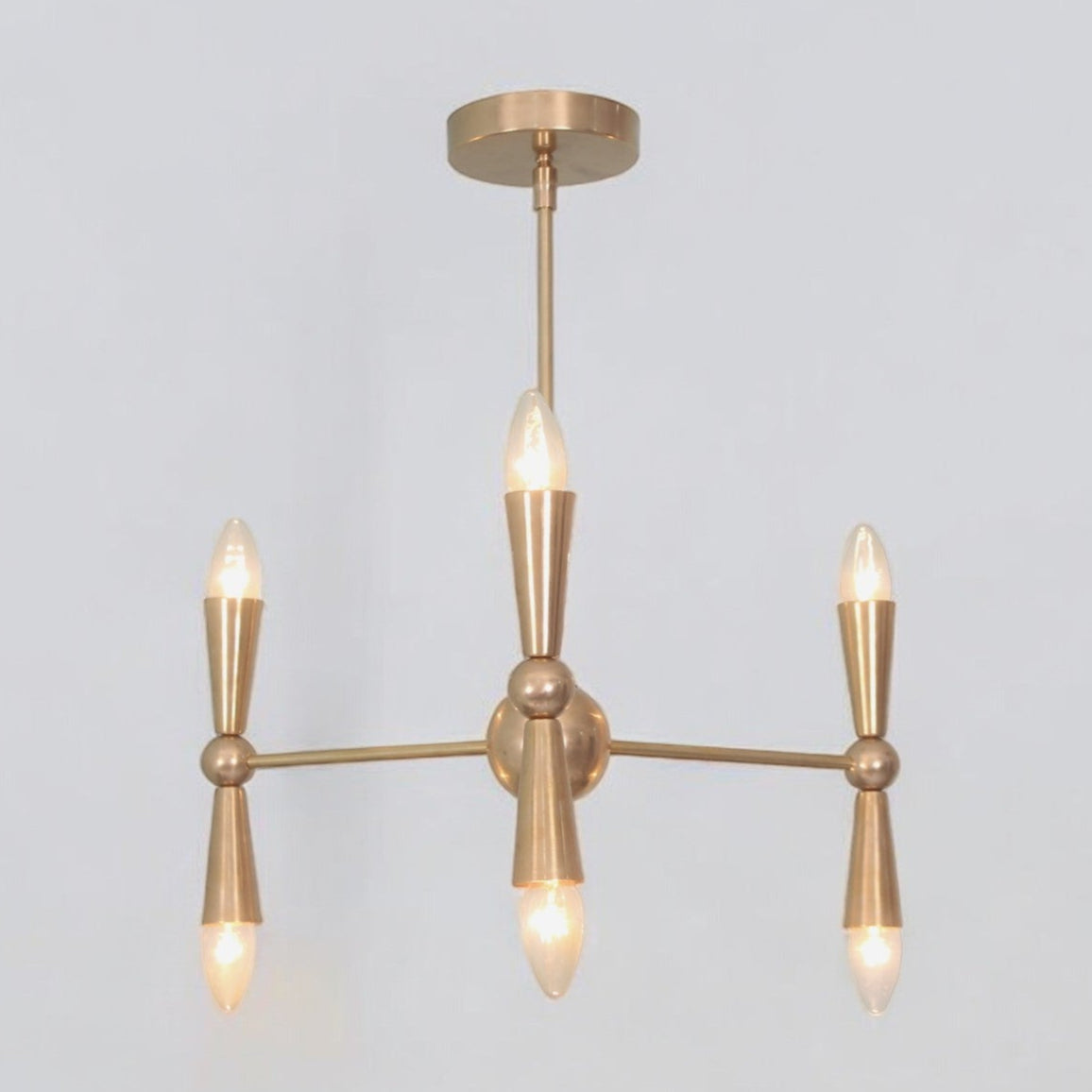 Brighten your space with the Italian Caracas Six Light Brass Sputnik Chandelier