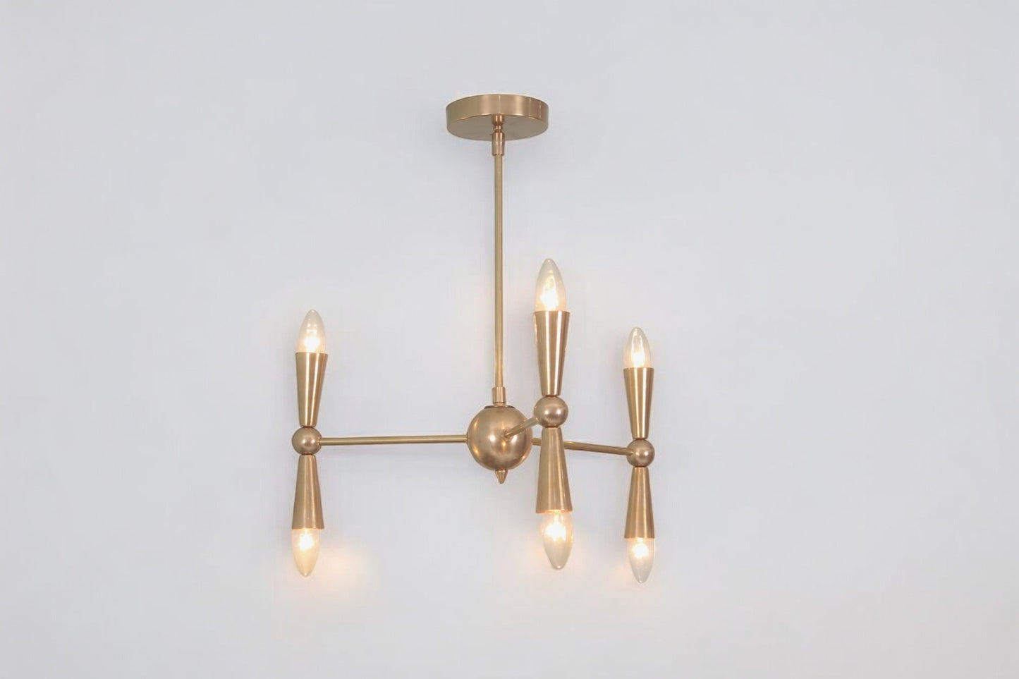 Brighten your space with the Italian Caracas Six Light Brass Sputnik Chandelier