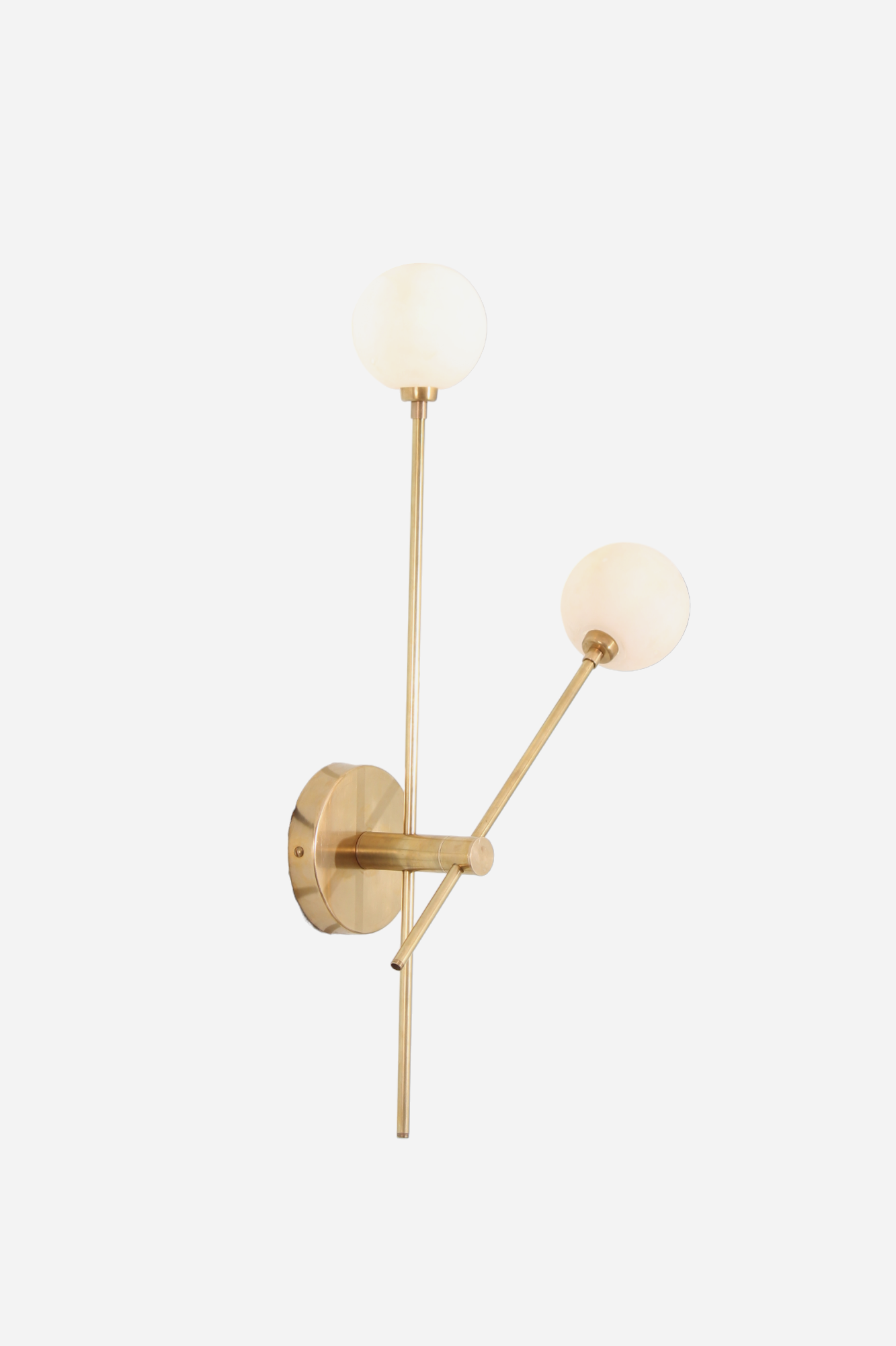 Brighten your space with the handcrafted Mid Century Raw Brass Wall Lamp and globe