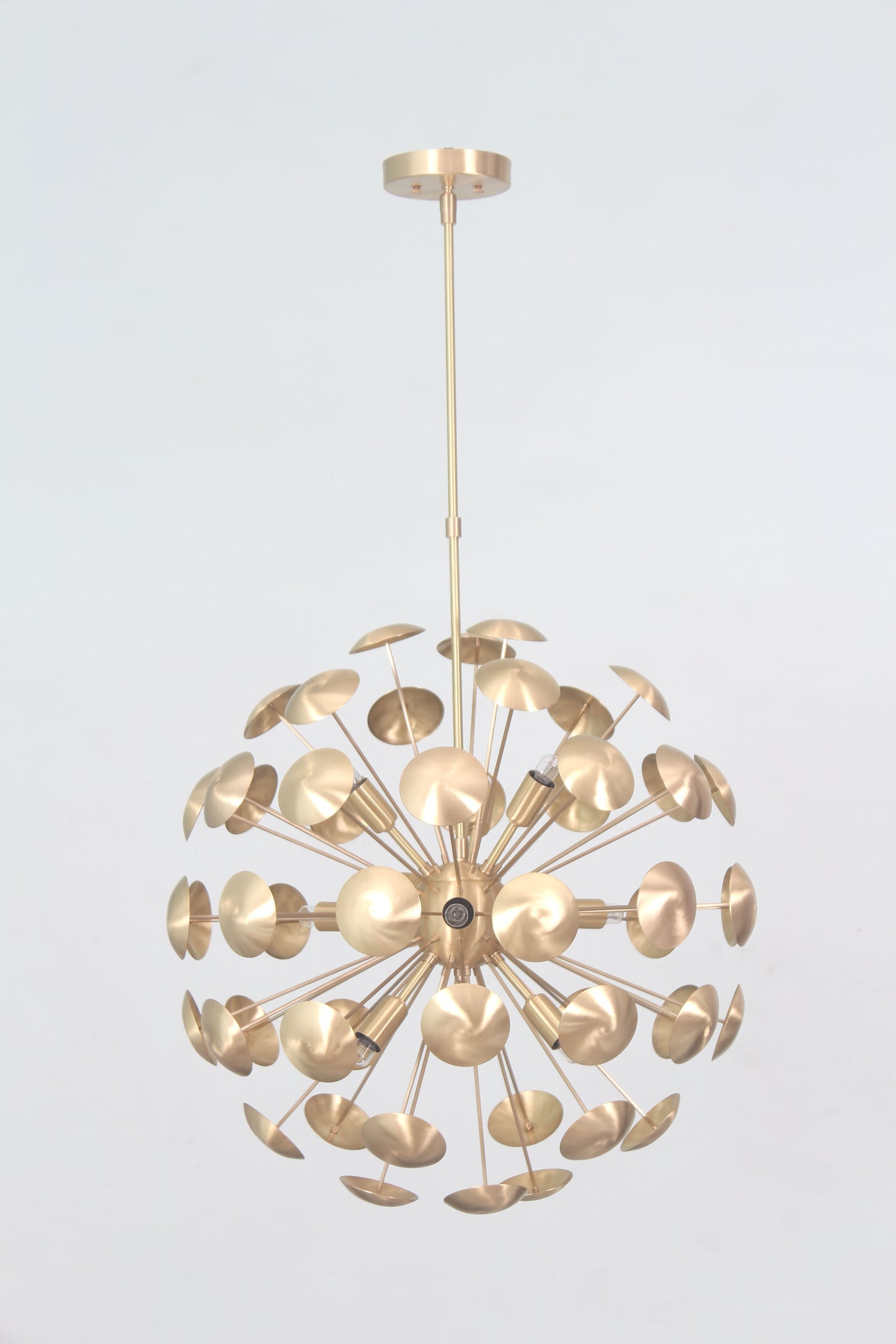 Elevate your space with the Mid-Century Nine Light Brass Sputnik Chandelier