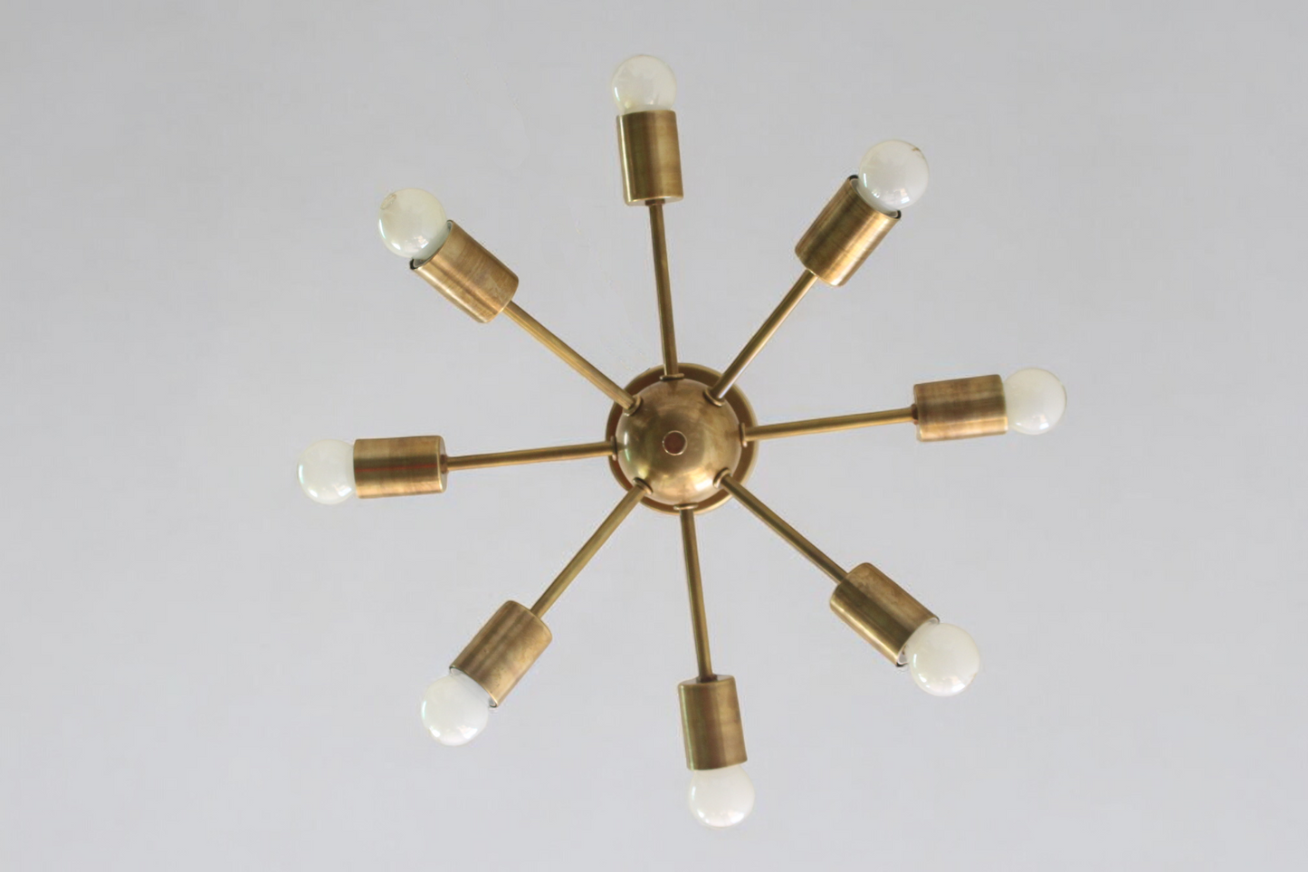 Elevate your space with the 8 Arm Sputnik Chandelier, blending modern style & elegance.