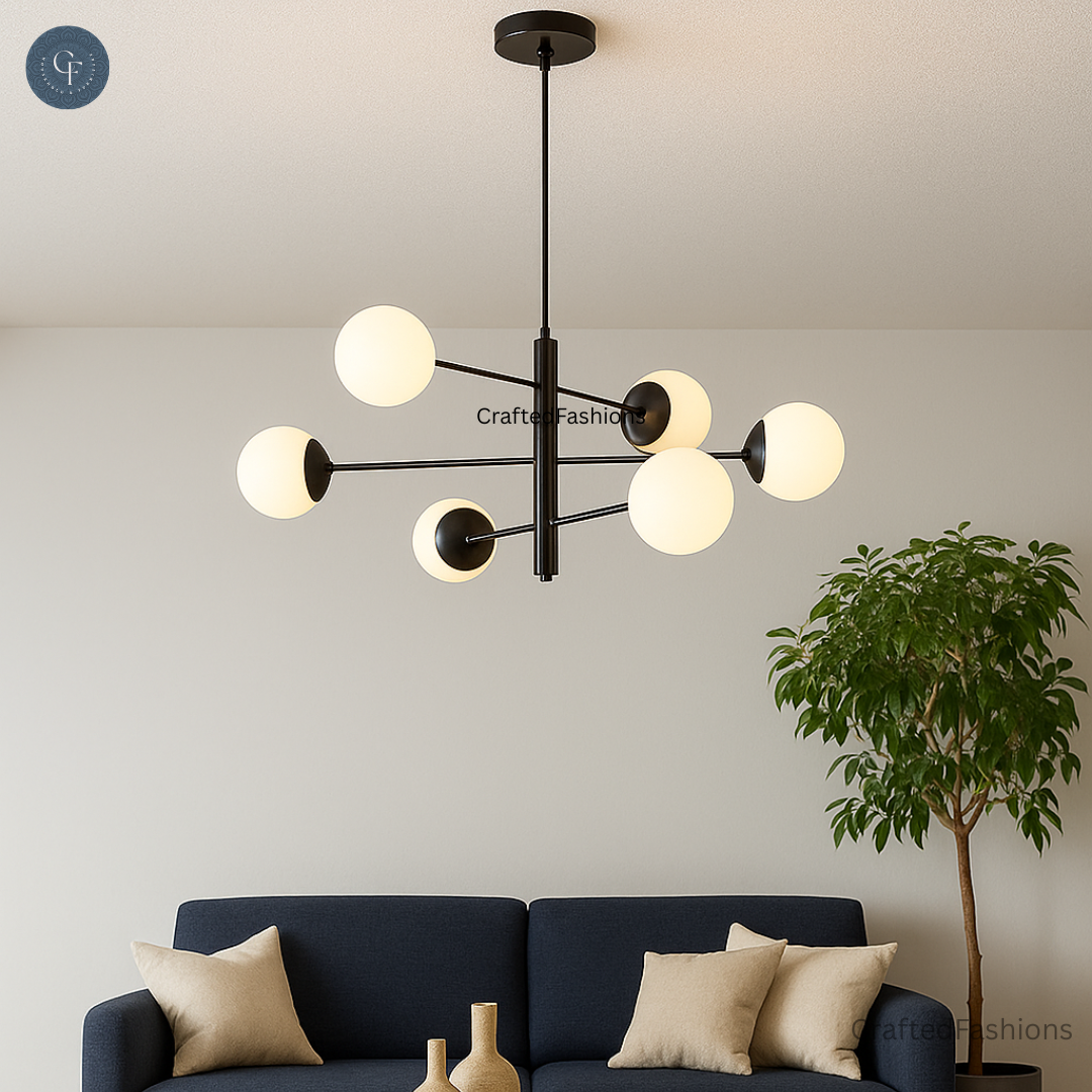 Stilnovo-style Sputnik chandelier with six globes and a brass finish for a sleek look