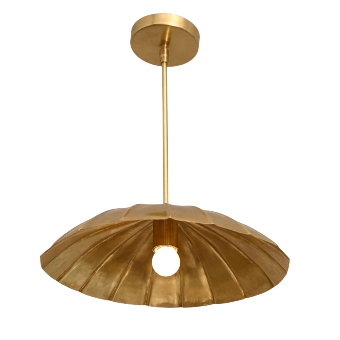 Handcrafted from brass, each chandelier features unique finish variations for a one-of-a-kind look